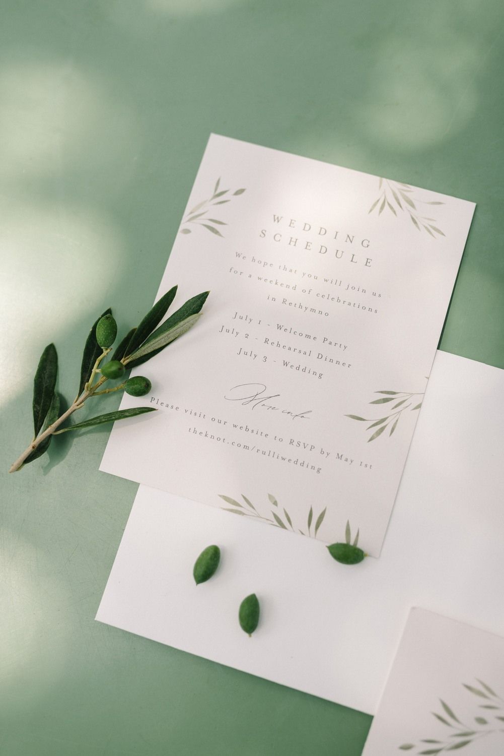 wedding stationery with olive green background