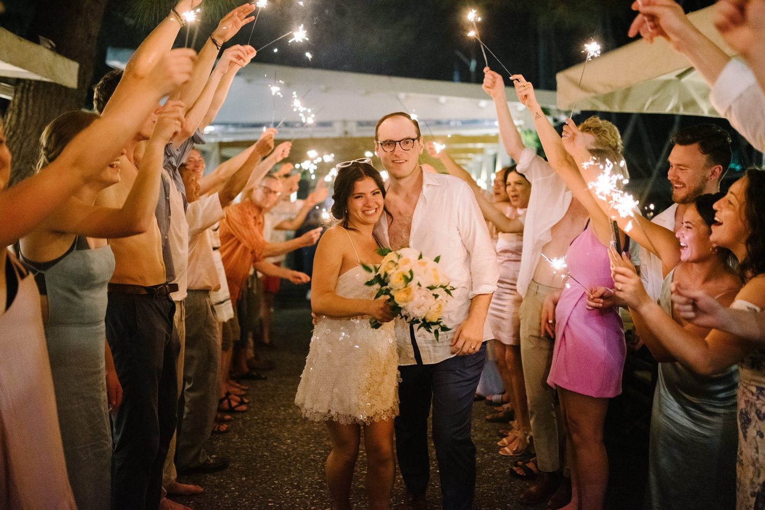corfu wedding couple under sparklers