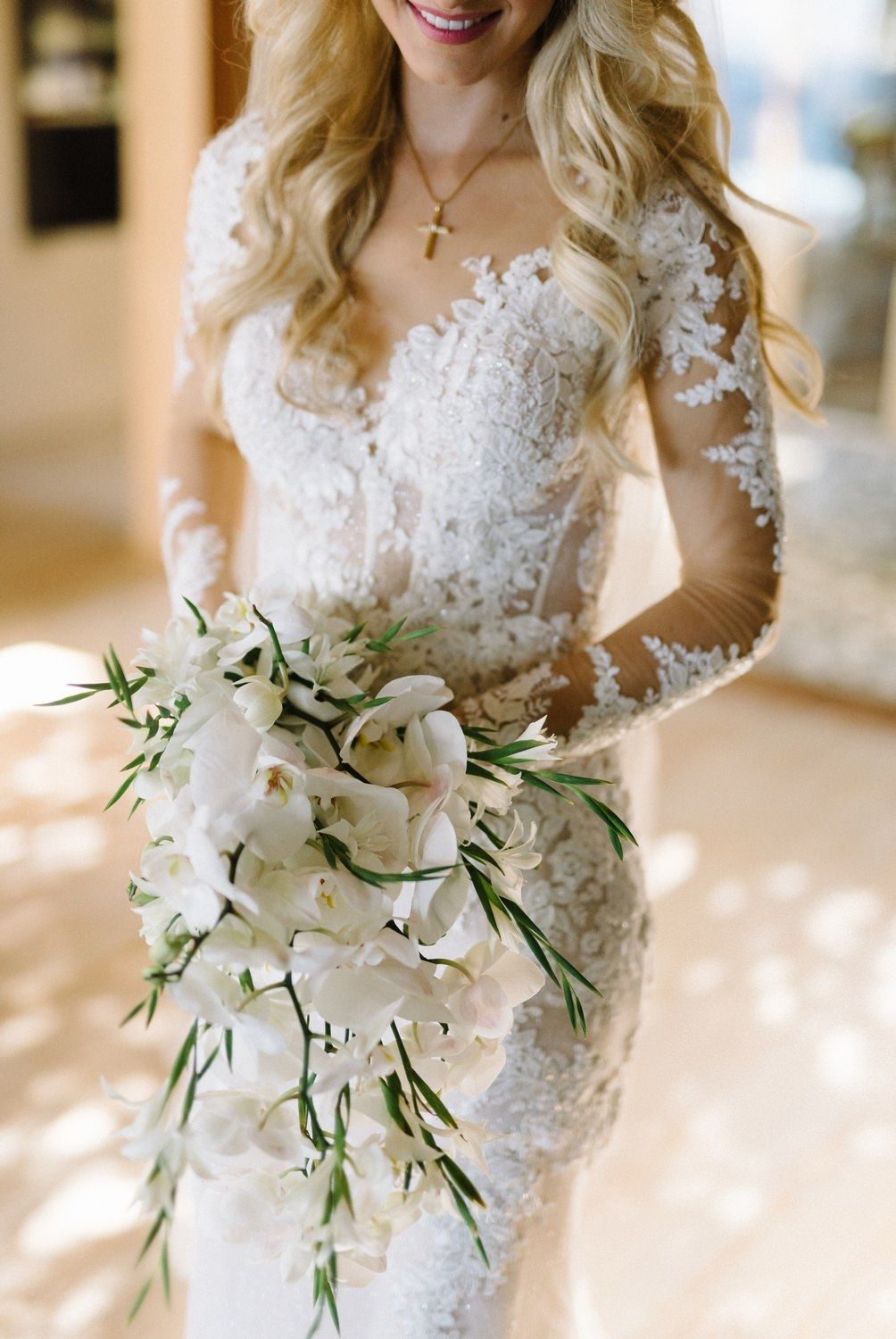 portrait of bride holding the wedding flowers