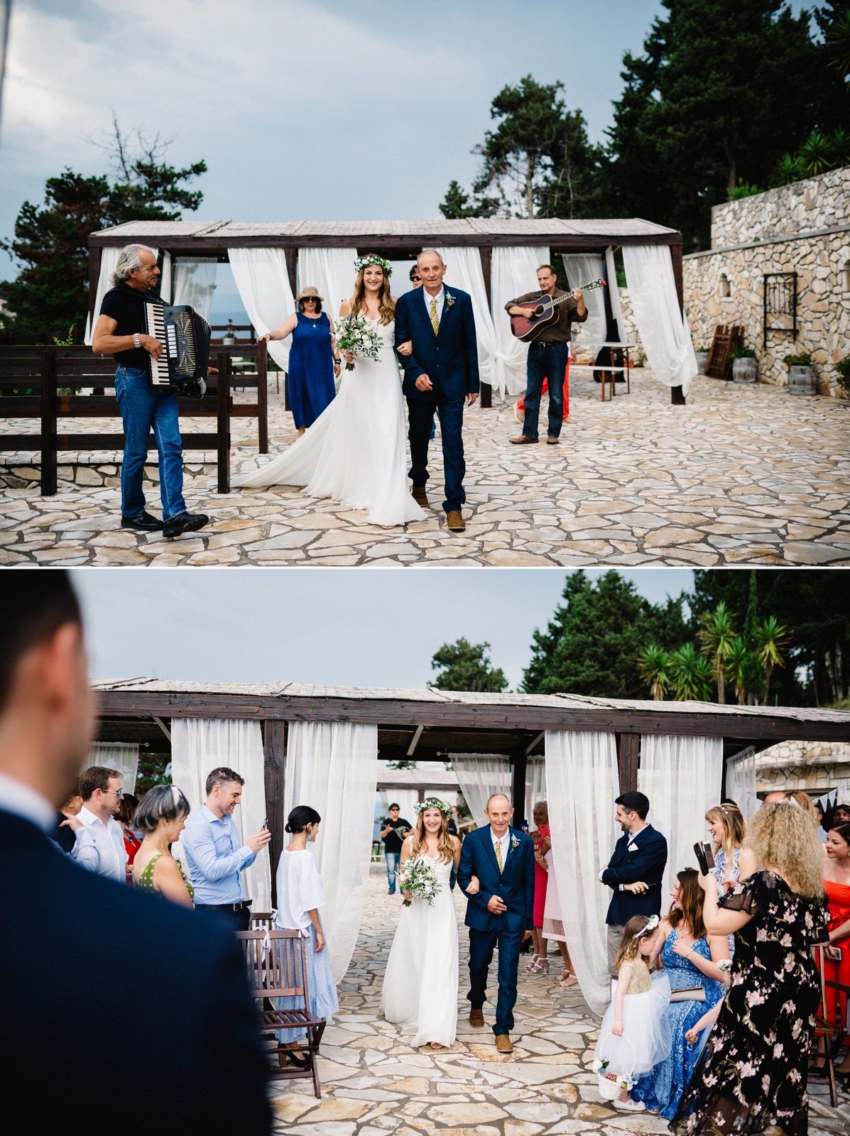 Wedding celebration with musicians and guests on a stone patio with white curtained pavilion.