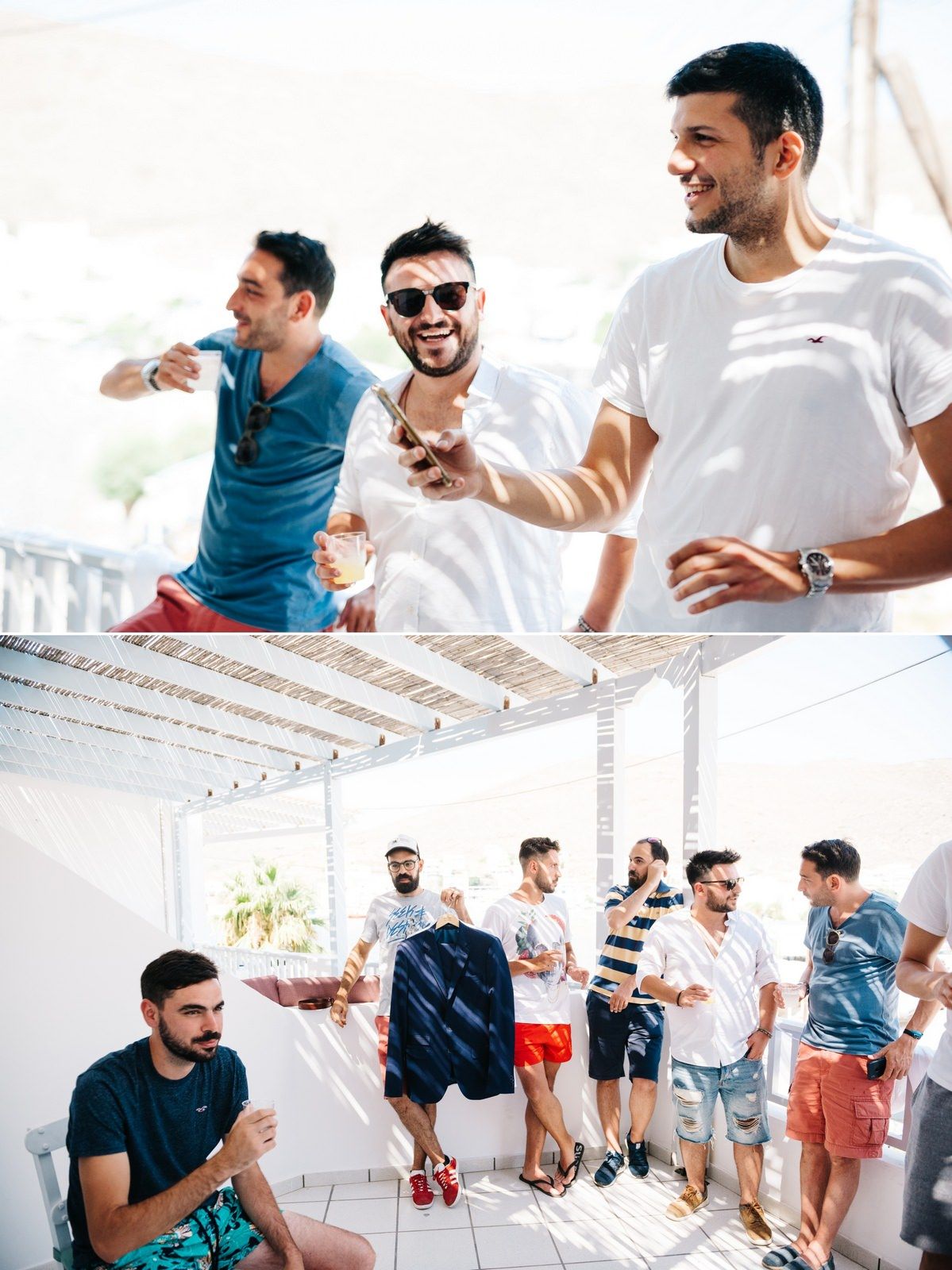 Groomsmen celebrating and dancing at Mediterranean wedding venue with white architecture.