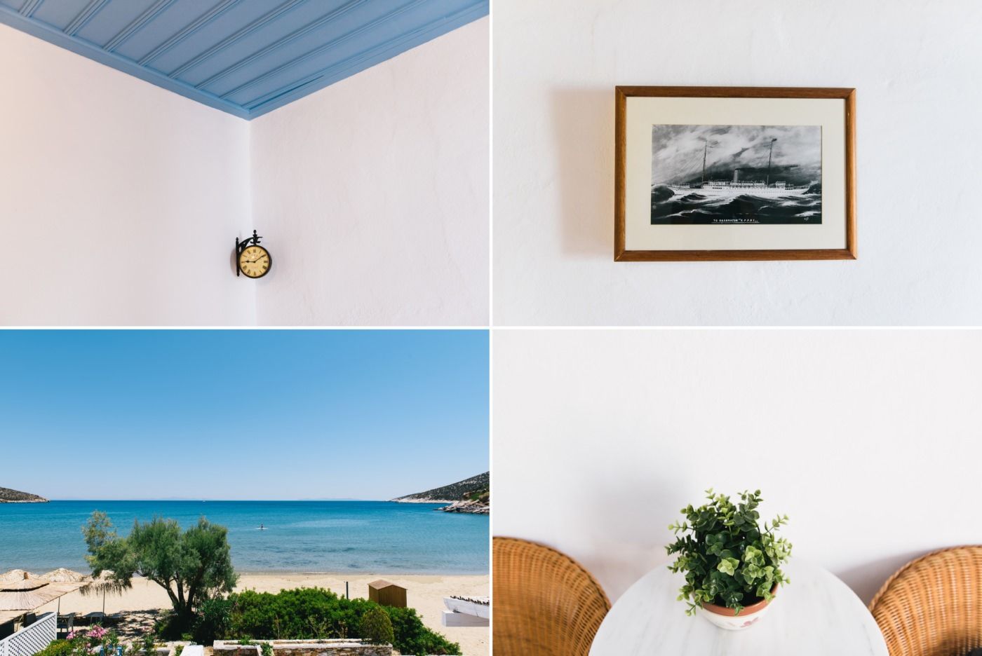 Coastal room interior with blue ceiling, framed art, and rattan chairs overlooking the sea.