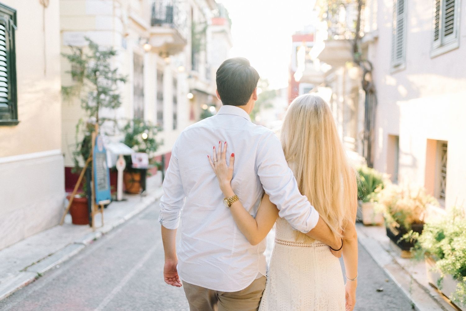 couple walking in monastiraki athens