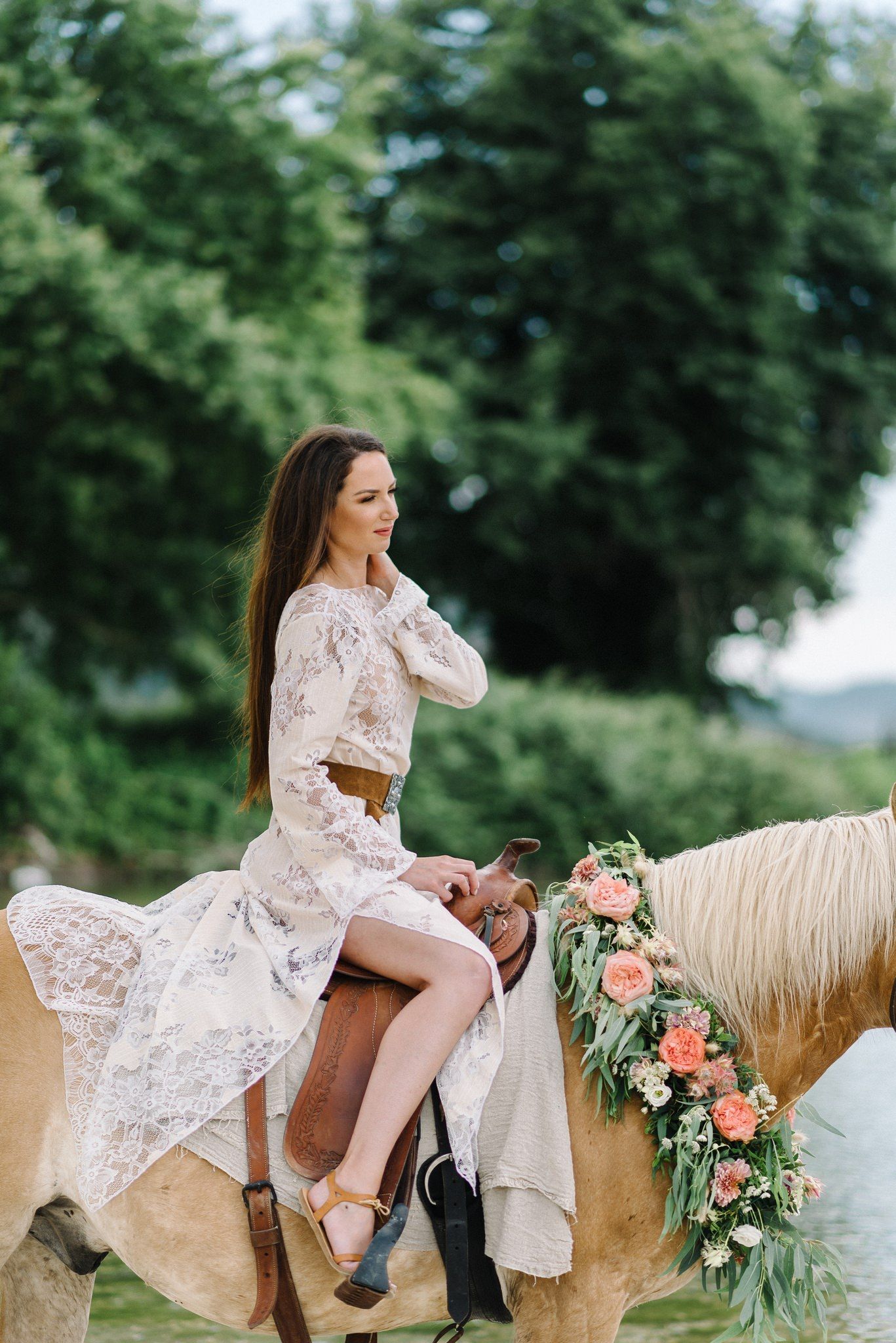portrait of bride riding a horse in acheron river in greece