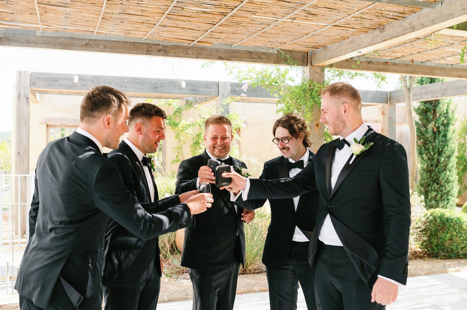 groomens having fun and say cheers