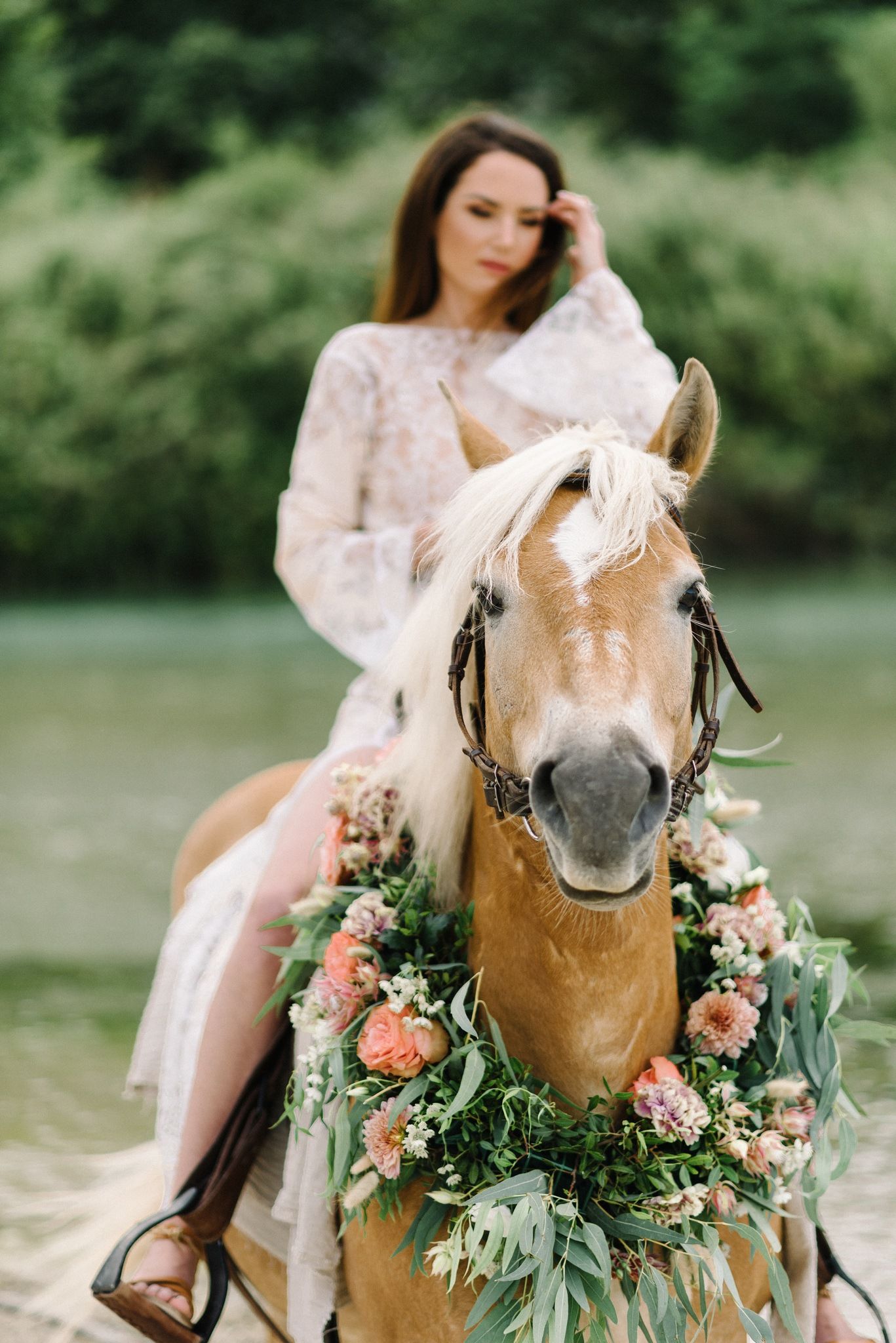 portrait of bride riding a horse in acheron river in greece