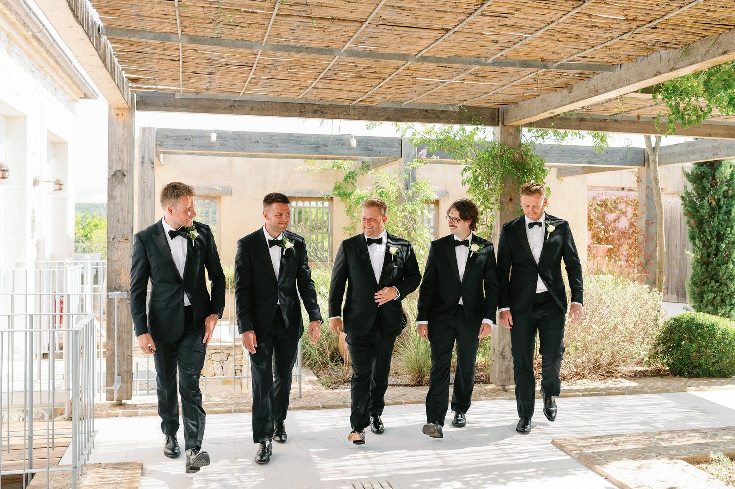 groomens walking and having fun