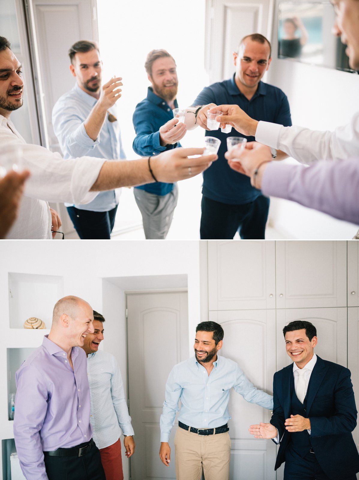 A group of formally dressed people gathered in a bright room sharing a moment together.