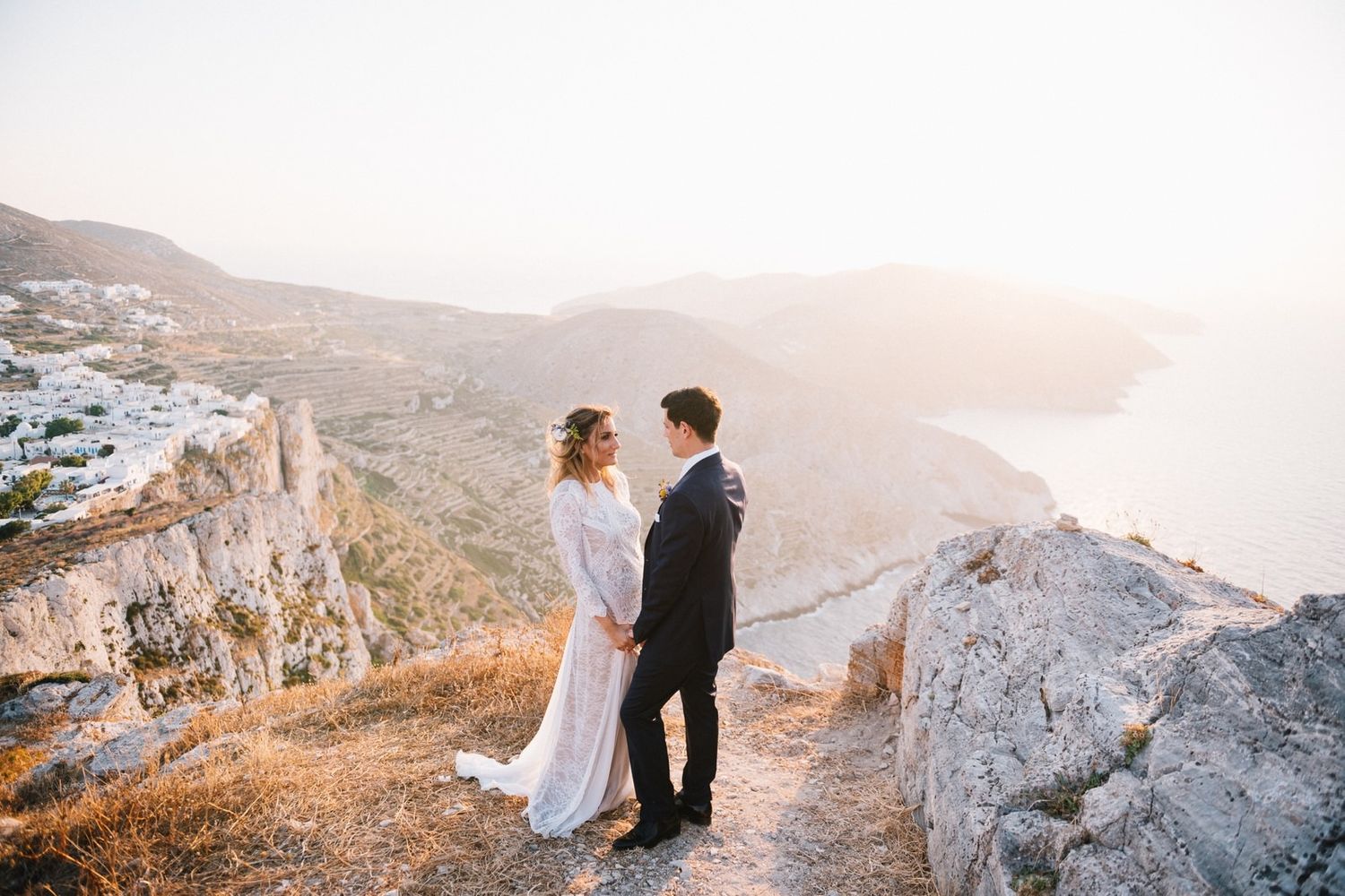 bride and groom portrait at folegandros with amazing view