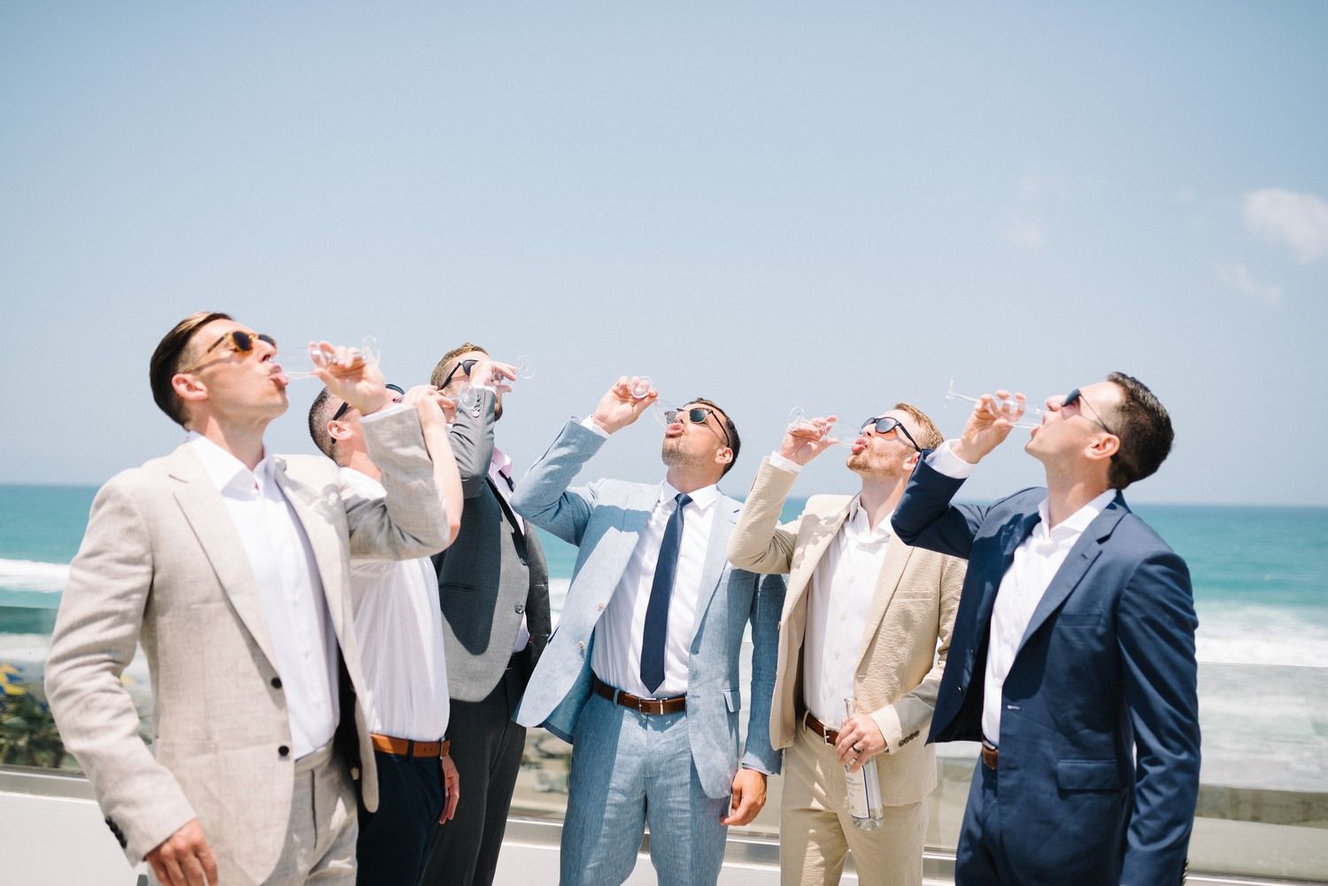 groomens having fun and say cheers