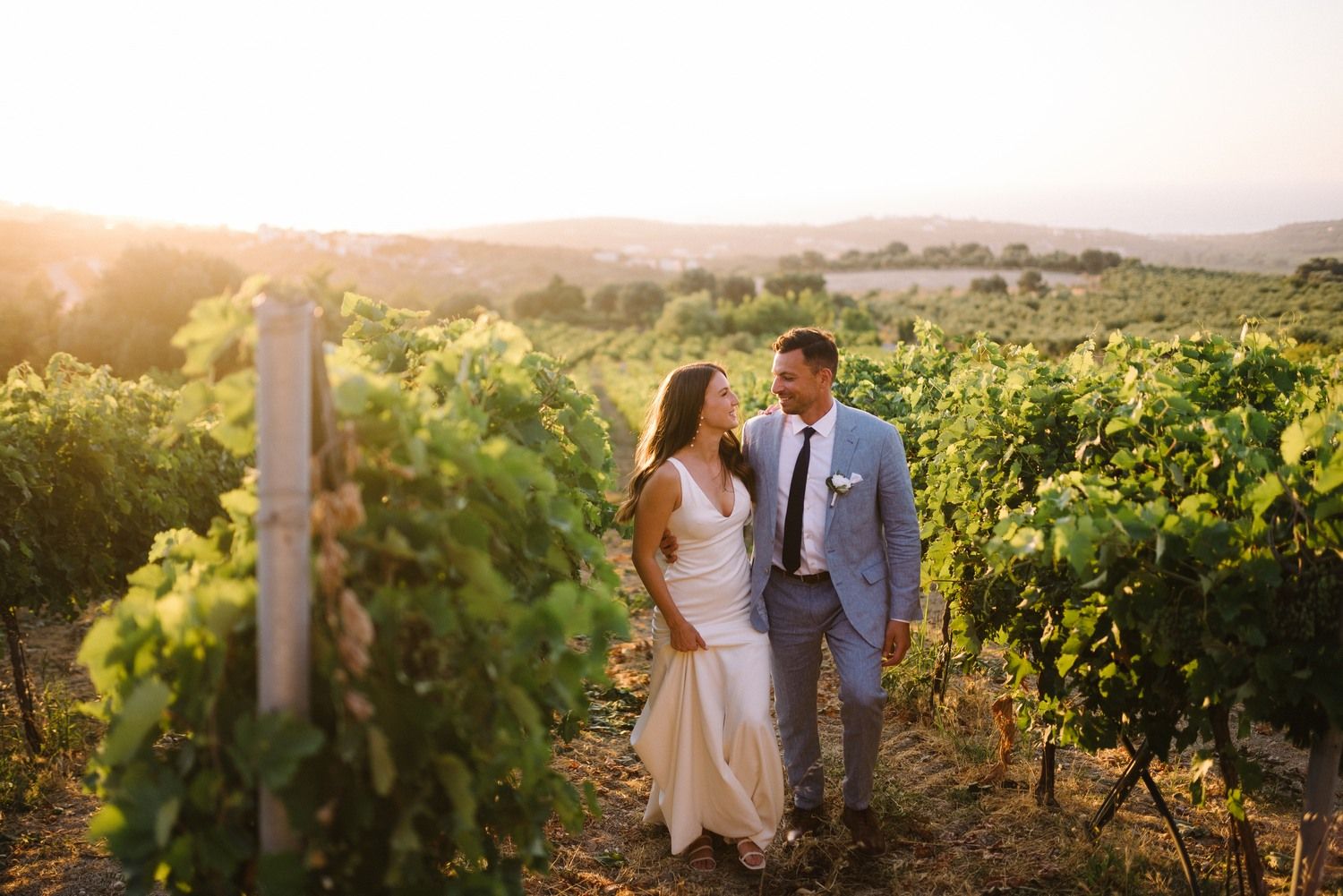 couple portraits at agreco farms vineyard in crete