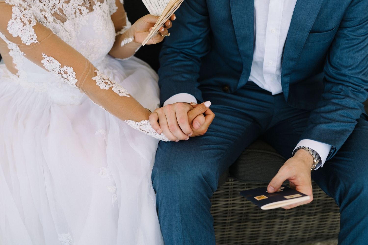 bride and groom reading their vows