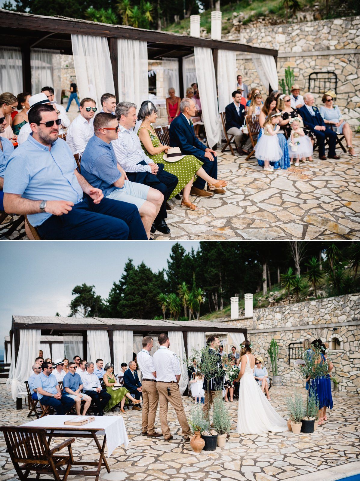 Wedding guests seated on stone patio during outdoor ceremony with white draped pavilion.
