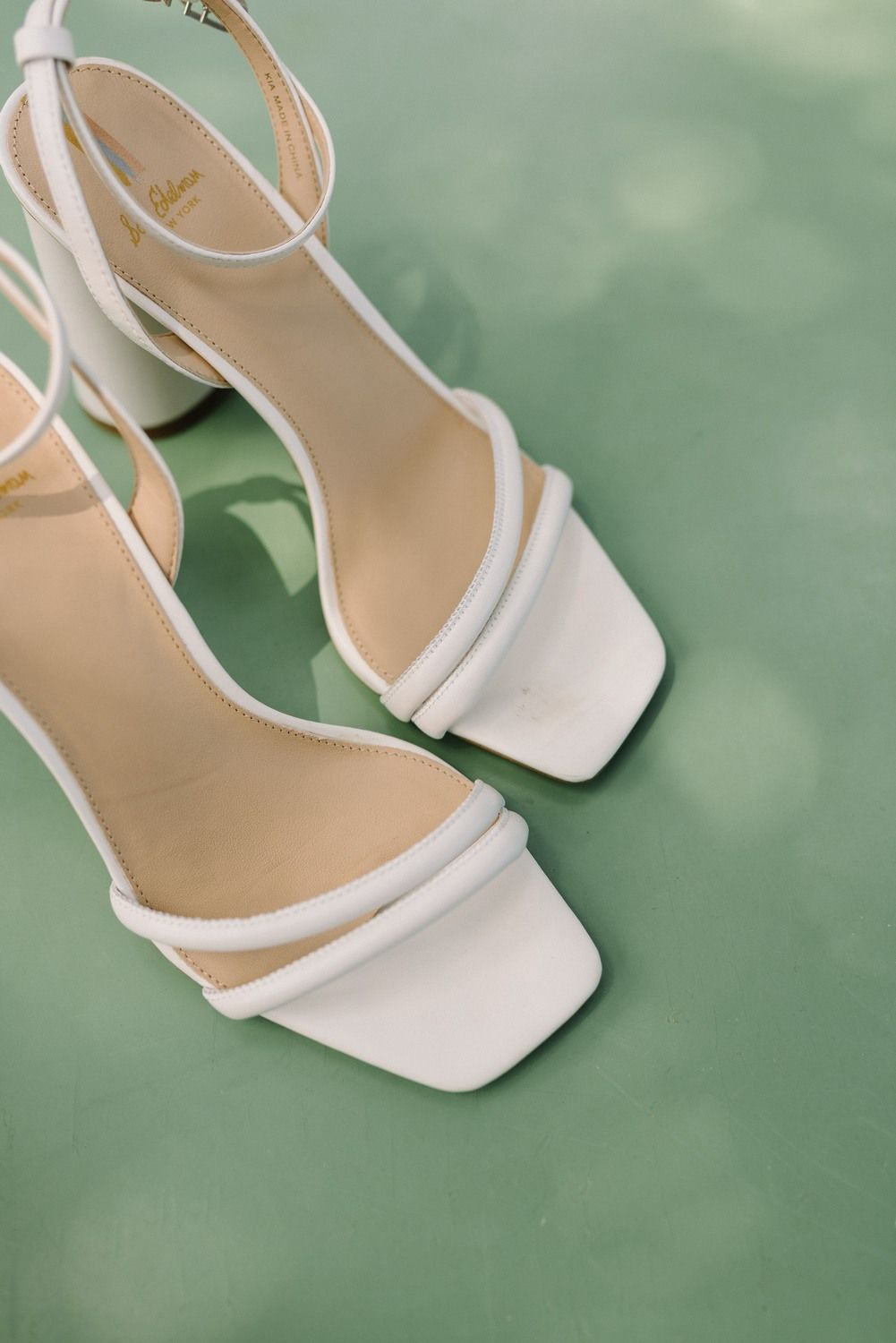 wedding shoes with olive green background