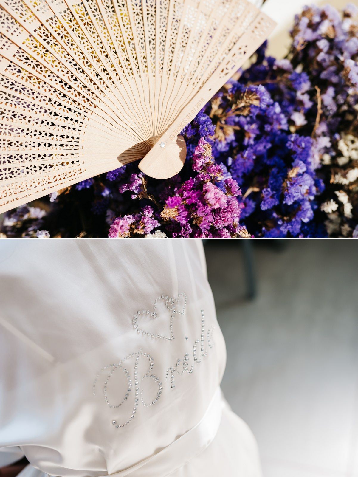 Wooden hand fan displayed against purple flowers with delicate floral detail embroidery on white fabric.