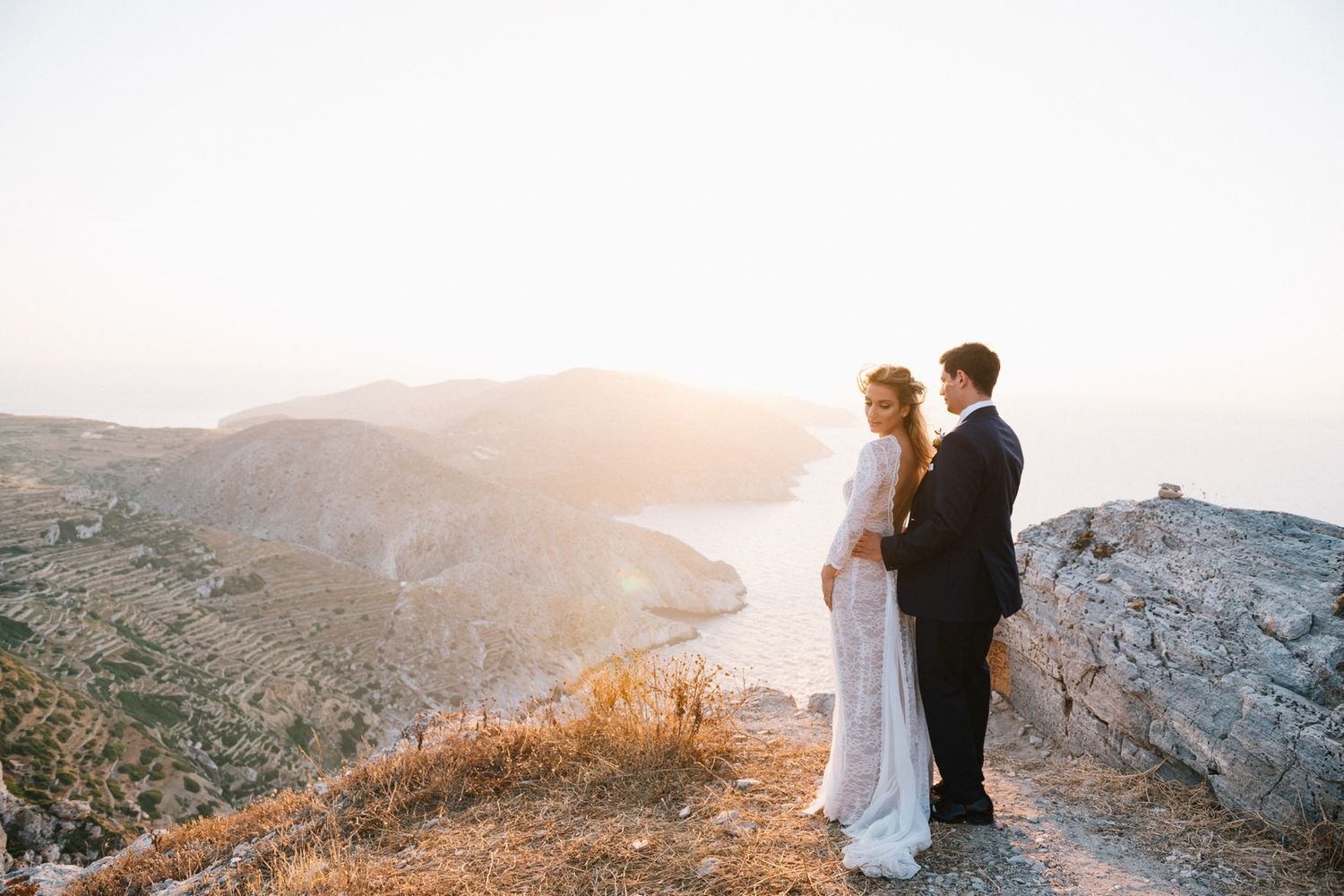 bride and groom portrait at folegandros with amazing view