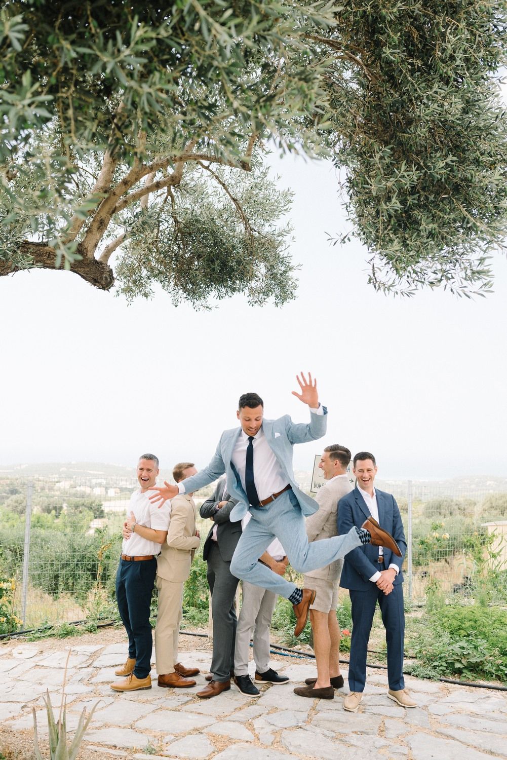 groom haveing fun at agreco farms crete