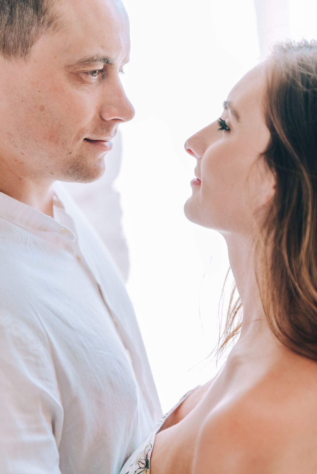 An intimate close-up portrait captured in soft natural light.