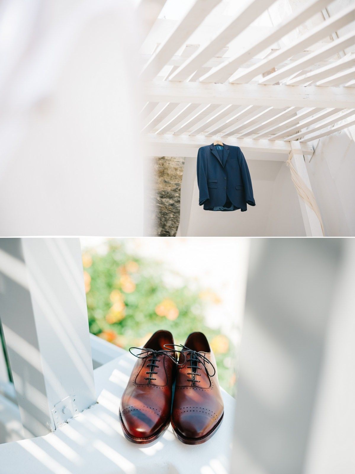 Wedding attire display showing blue suit jacket and brown leather dress shoes on white structure.