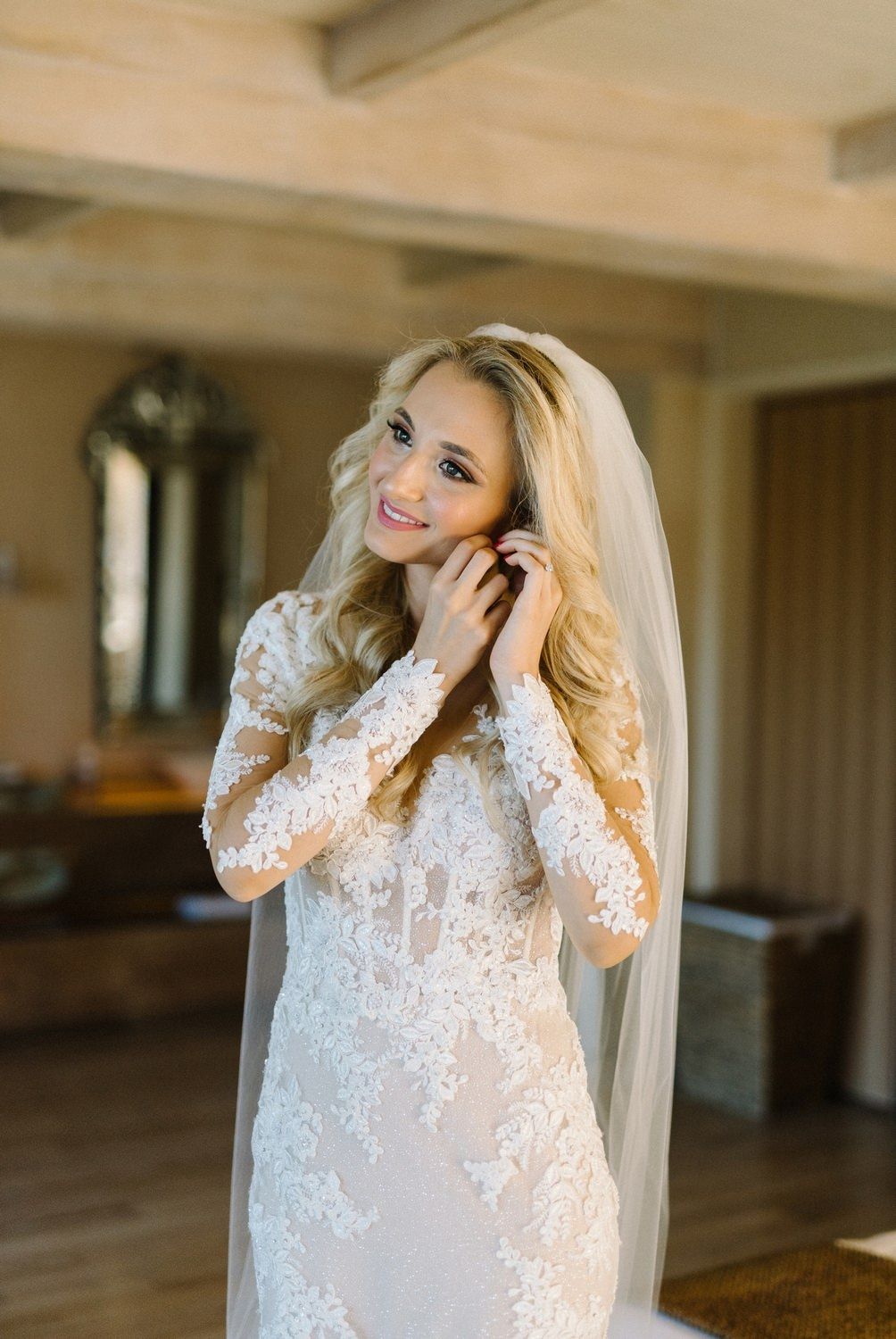 bride is wearing the earring