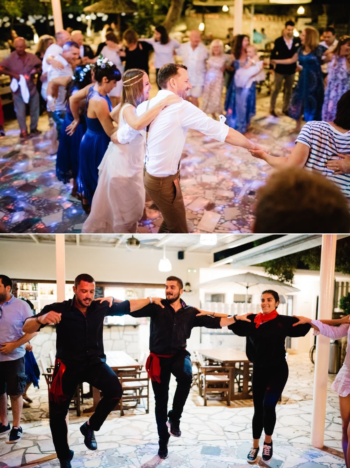Wedding party dancing and celebrating on an outdoor dance floor during reception.