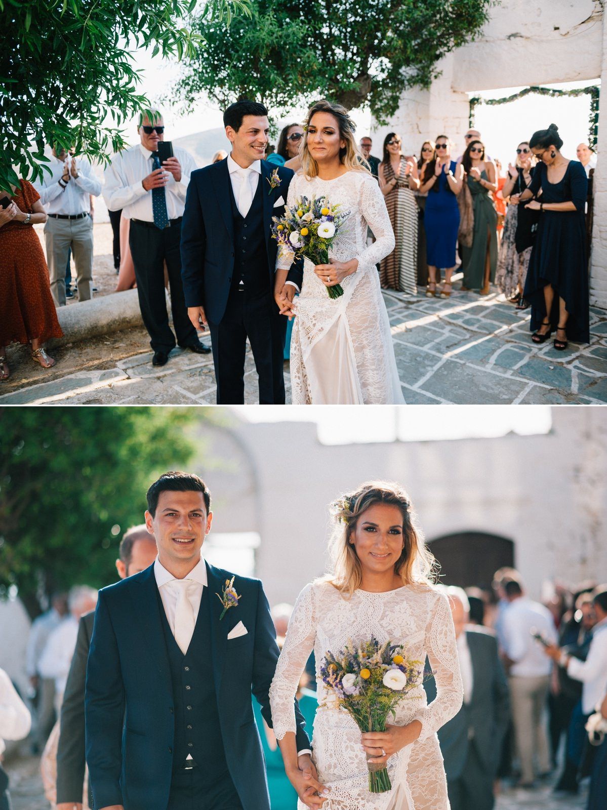 Wedding ceremony taking place in whitewashed Greek courtyard with gathered guests.