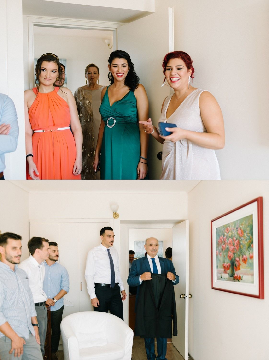 Two groups chatting in separate areas of a room with a red floral painting.
