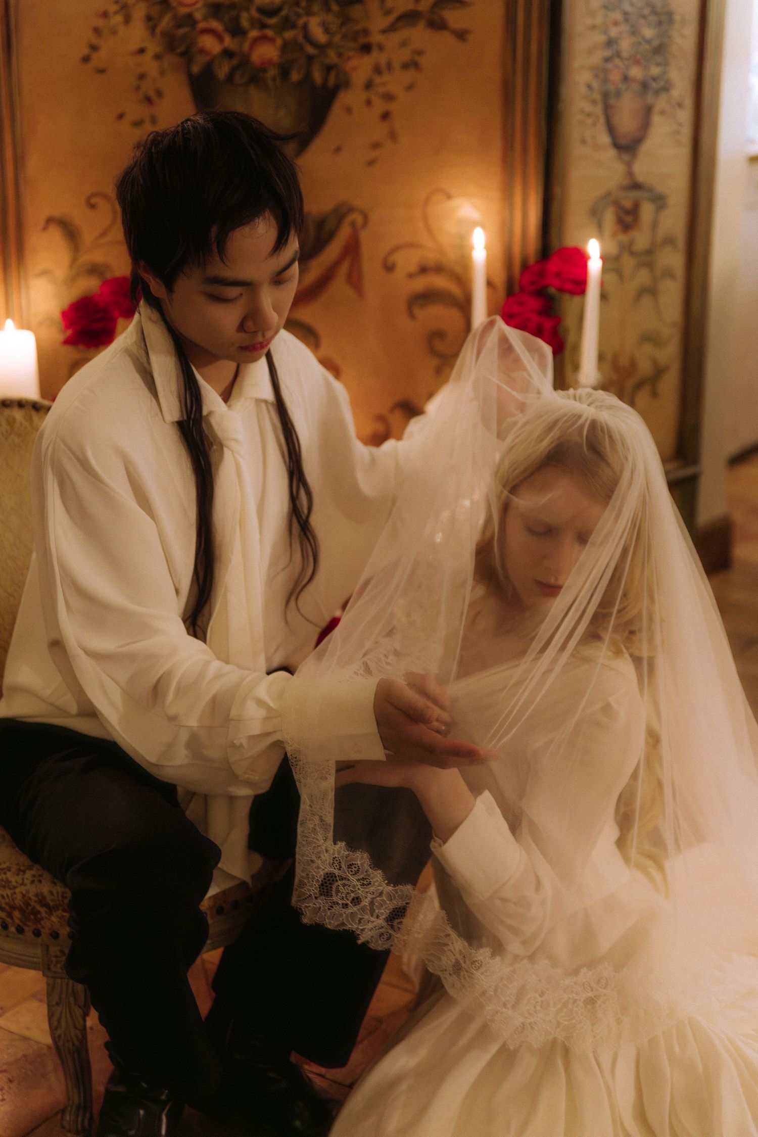 Destination wedding couple inside Paris apartment with classic French interior