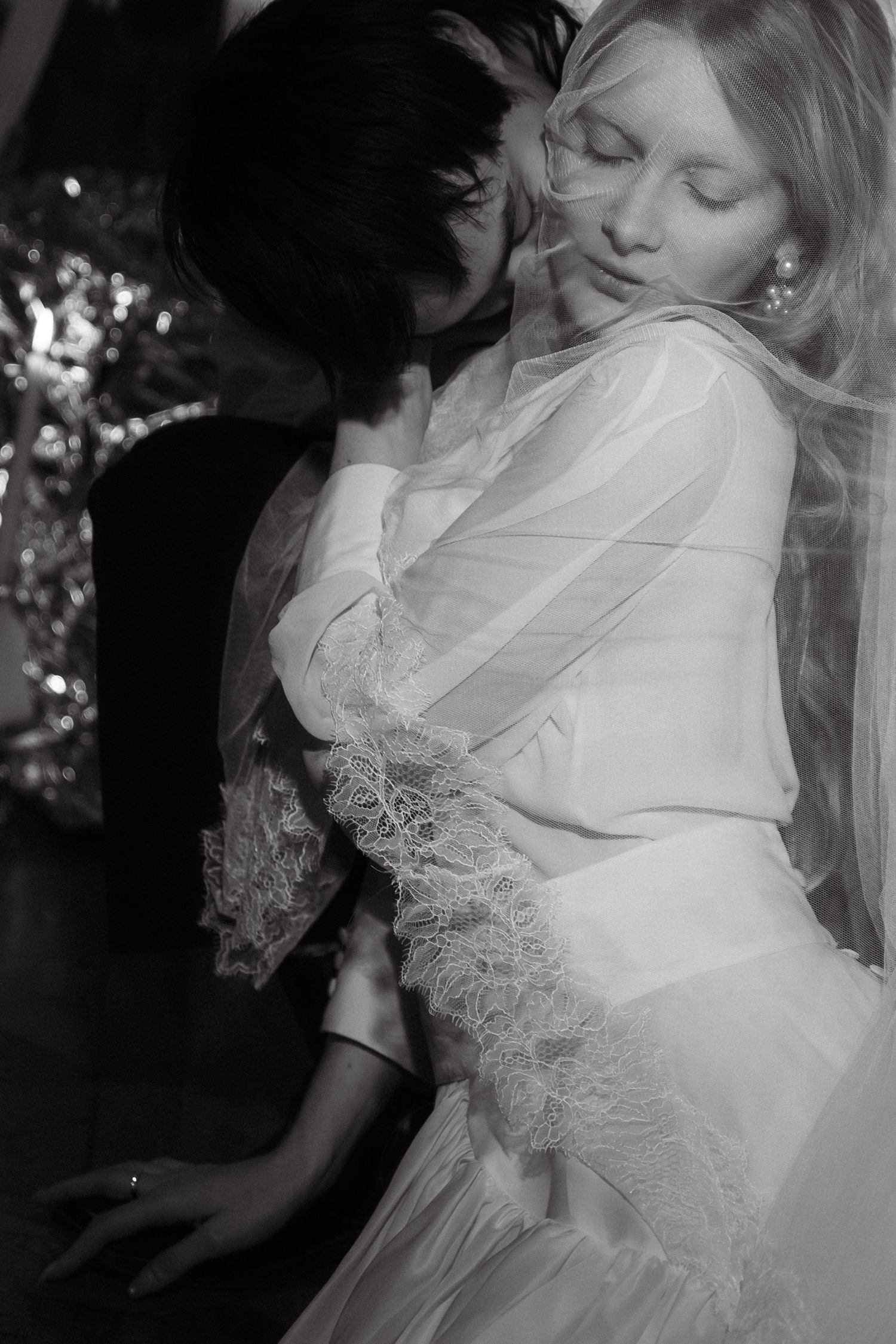 Romantic couple portrait in Paris during a moody November evening destination wedding shoot