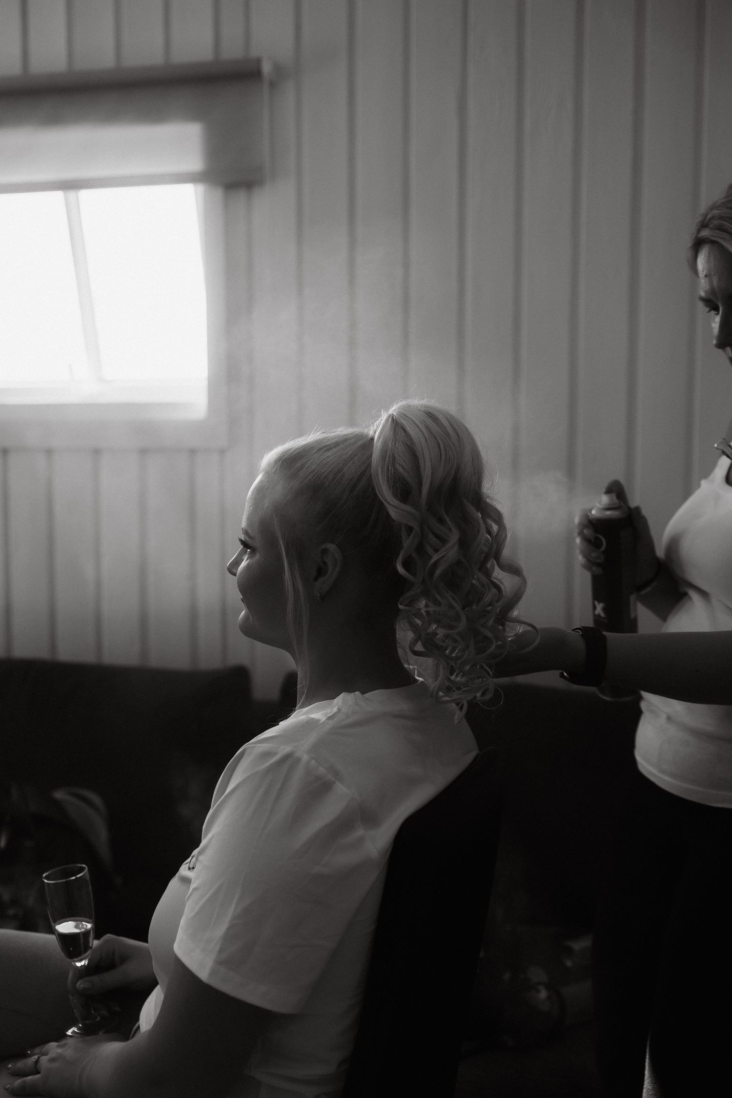 Documentary wedding photograph of bride during getting ready on her wedding morning. Wedding photographer Greete Rätsep.