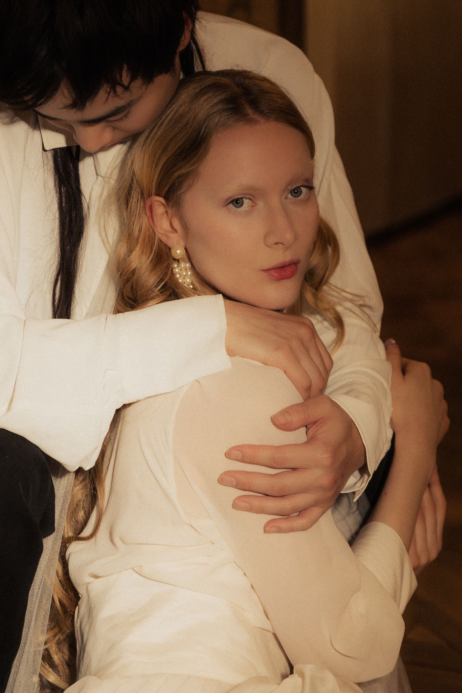 Romantic couple portrait in Paris during a moody November evening destination wedding shoot