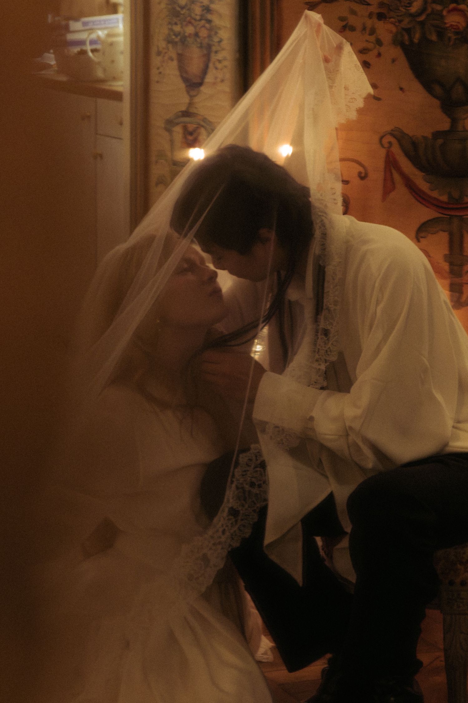 Destination wedding couple inside Paris apartment with classic French interior