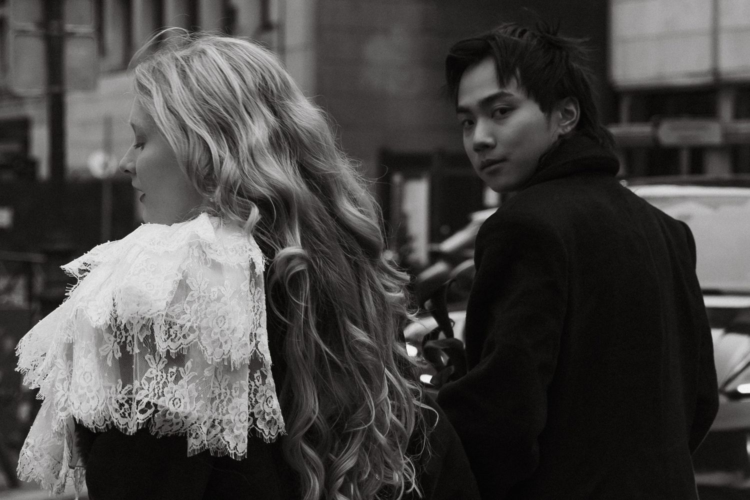 Romantic couple portrait in Paris during a moody November evening destination wedding shoot