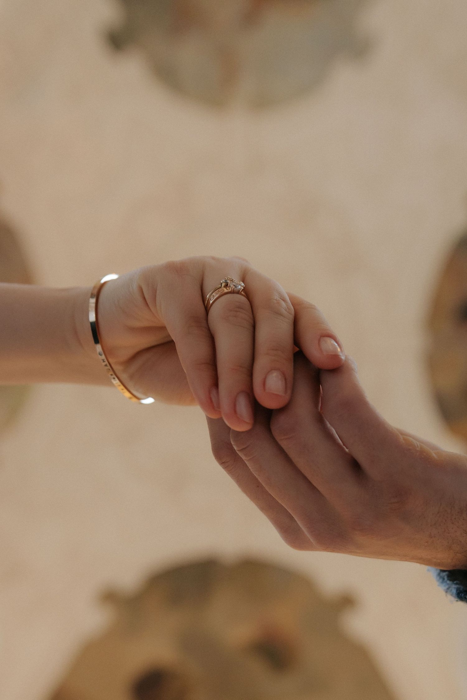 Elegant couple portrait in front of a historic manor house during a destination elopement