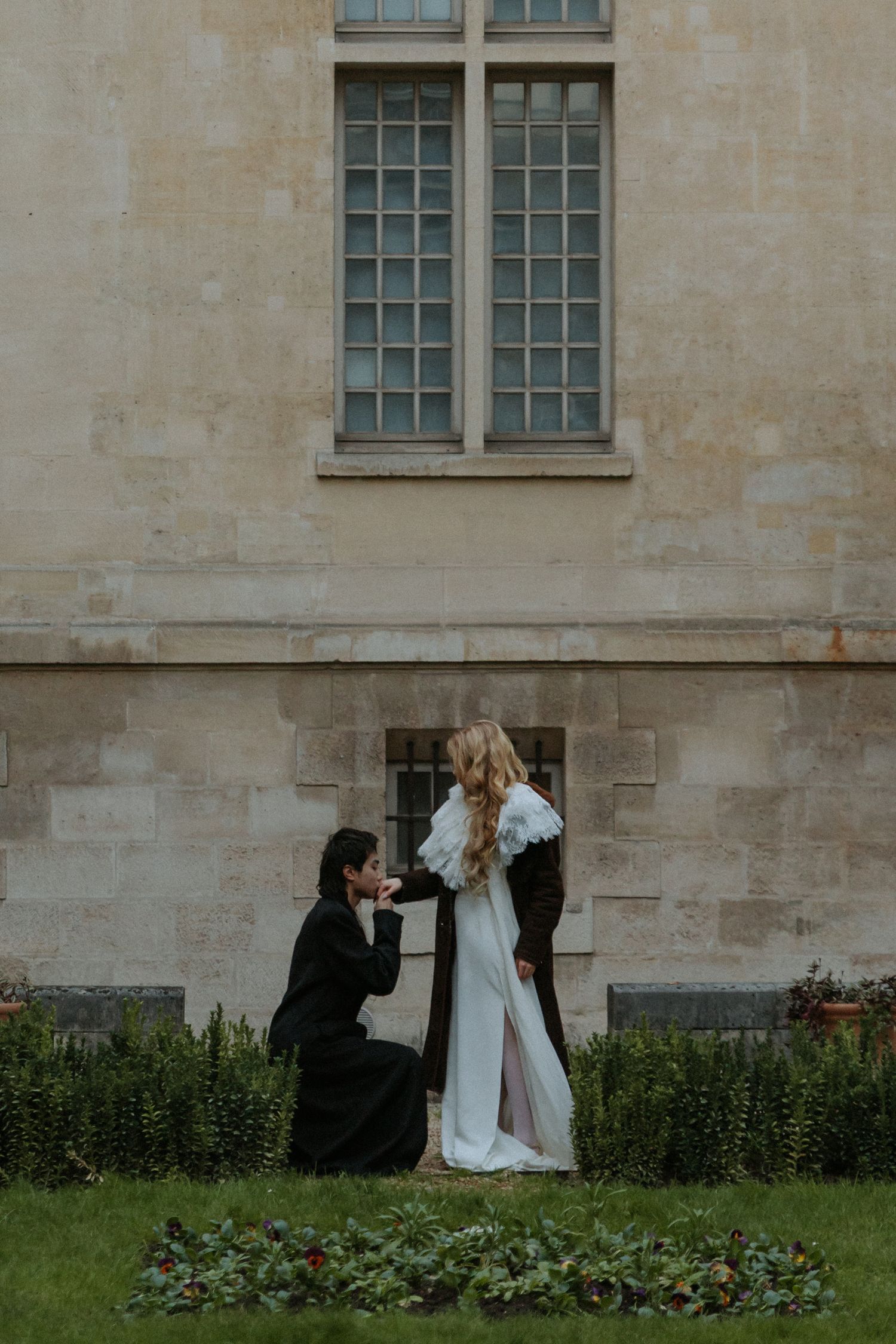 Romantic couple portrait in Paris during a moody November evening destination wedding shoot
