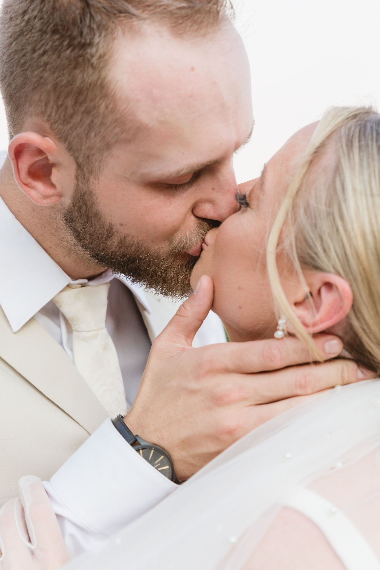 A romantic sequence of intimate kissing moments captured in a light and airy style.