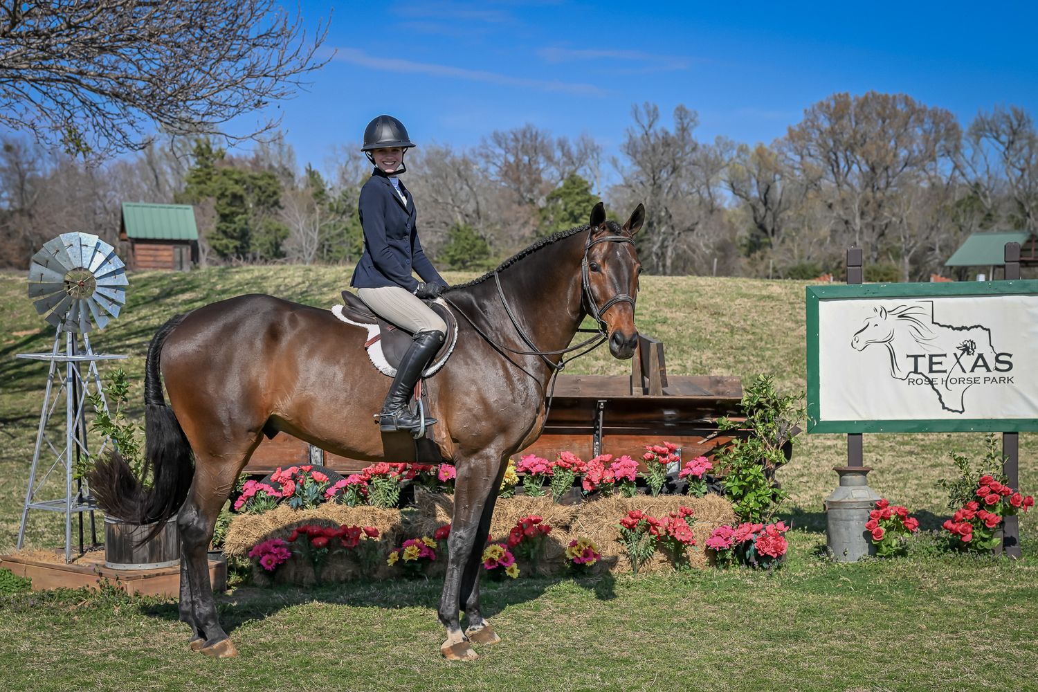 A celebratory photo at the end of a long day of equestrian competition.