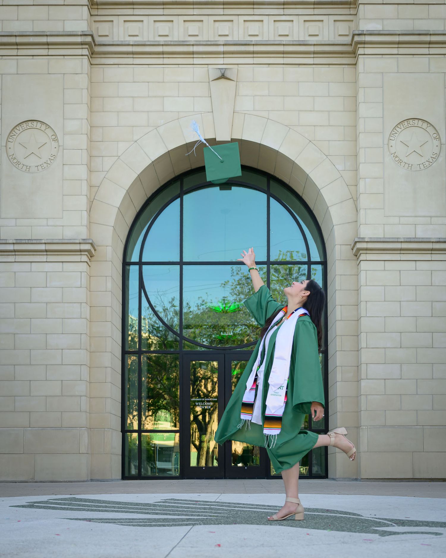 A series of architectural photos showing arched doorways and windows in a white stone building facade.