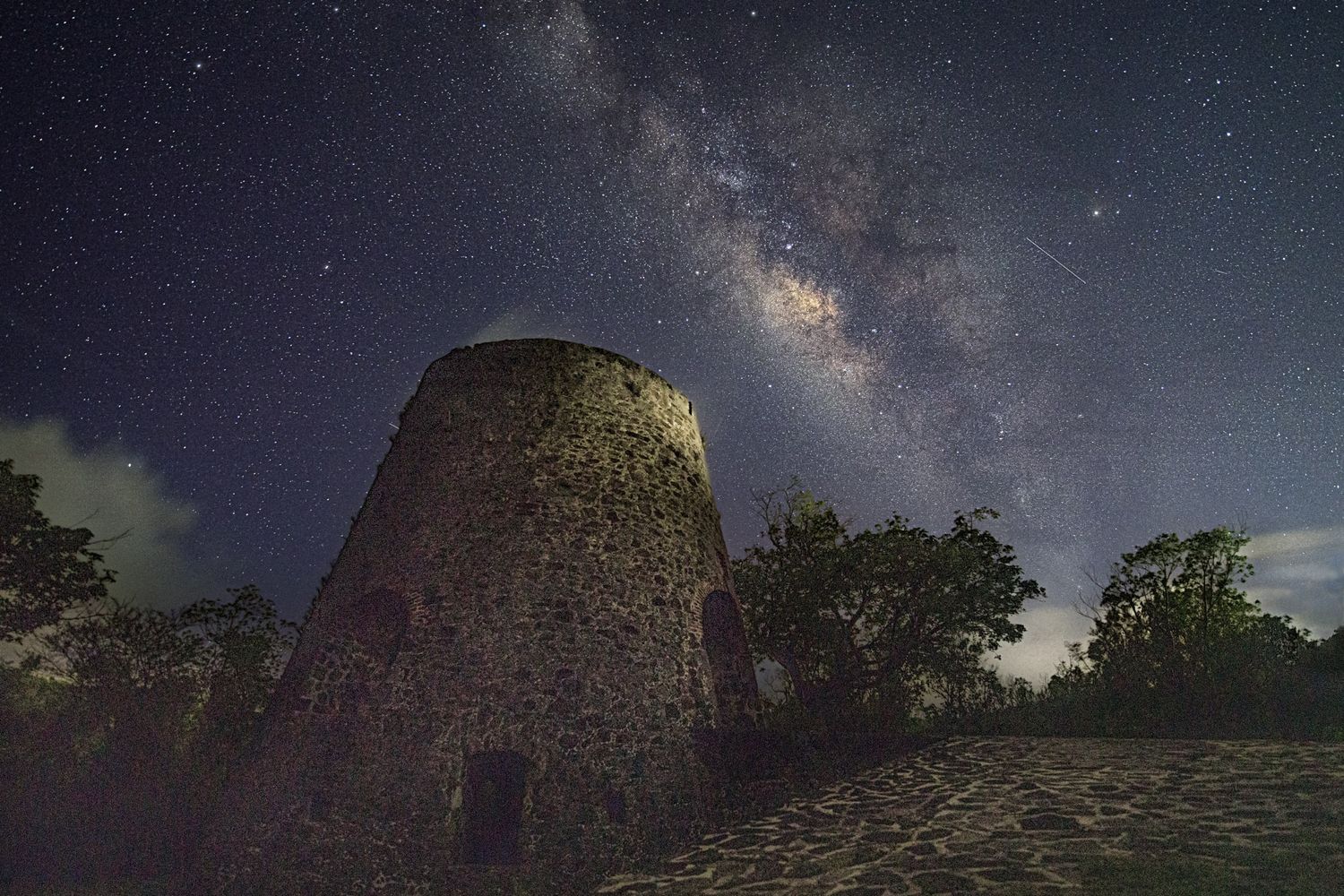 Ruins in St. John rest under the Milky Way — night-sky exploration of light and wonder as captured by Sean Stacey.