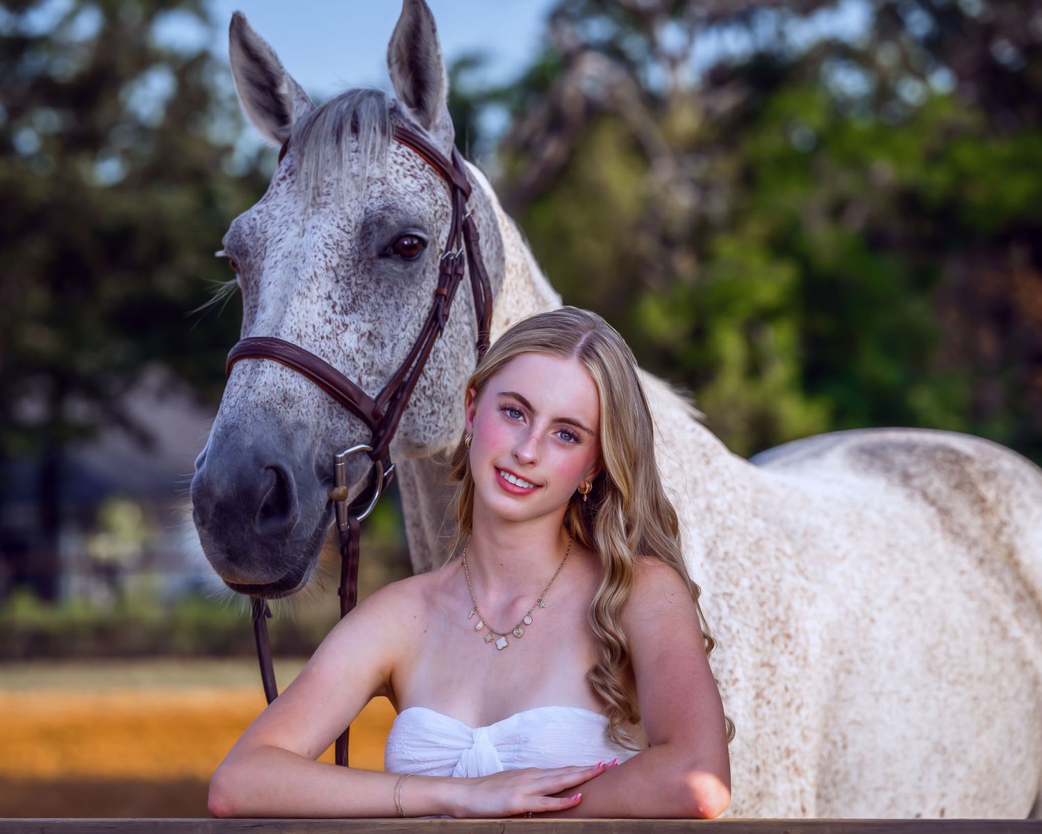 Senior portrait session with horse at Texas barn — fine-art equestrian photographer