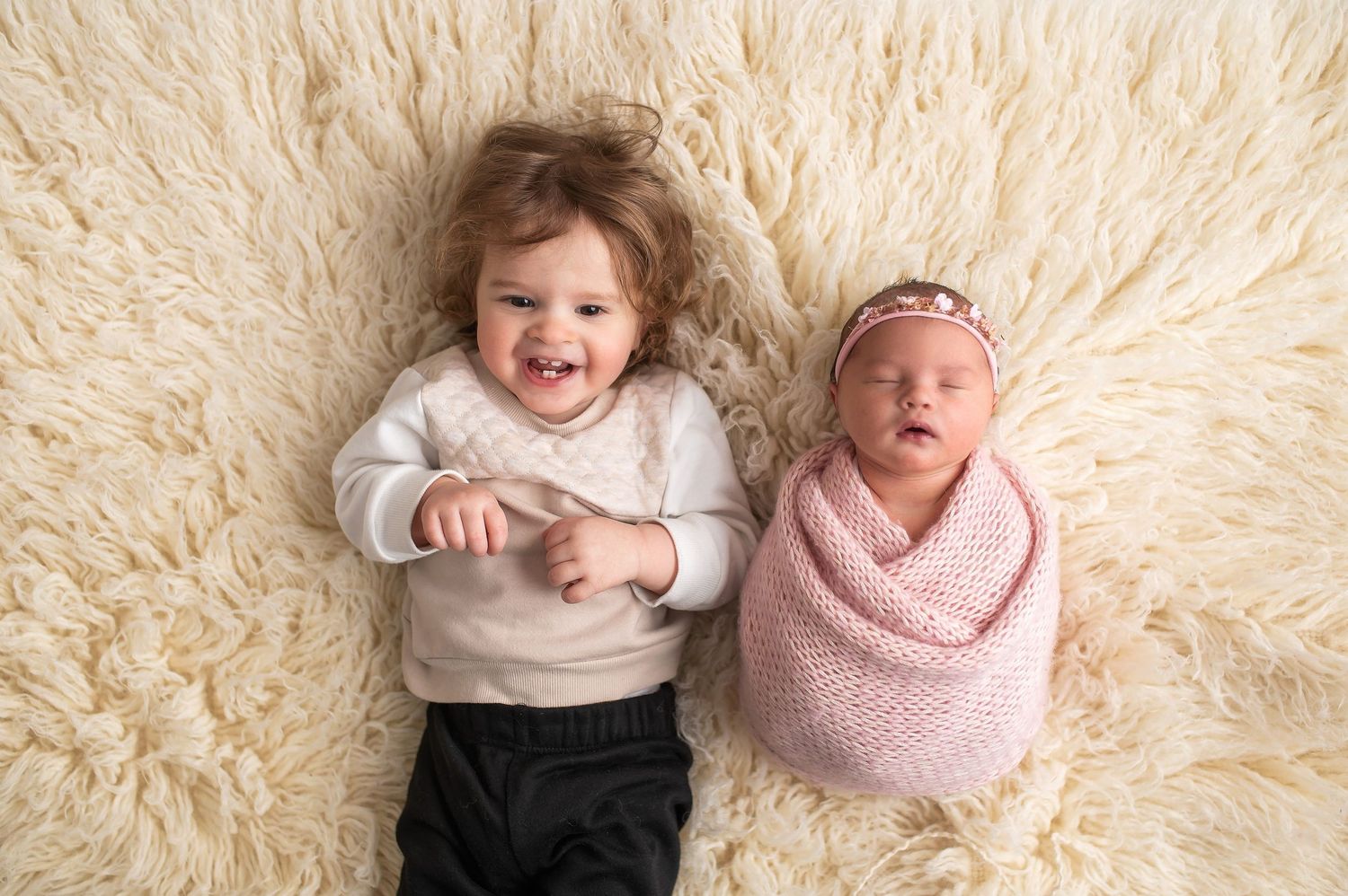 Series of infant portraits showing baby posed on fluffy cream colored fur rug.
