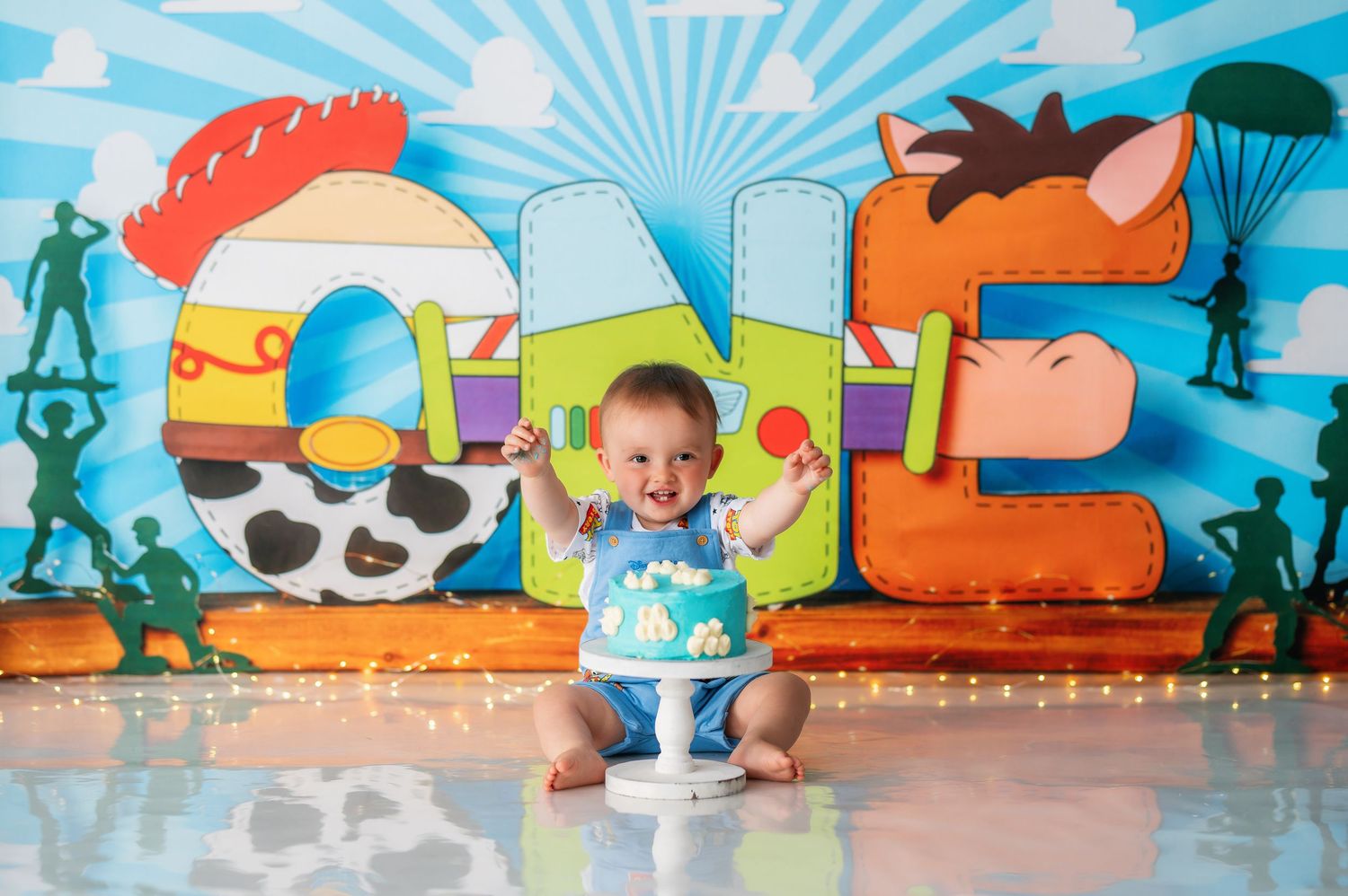 Colorful indoor playground area with cartoon animal murals and play equipment against vibrant painted walls.