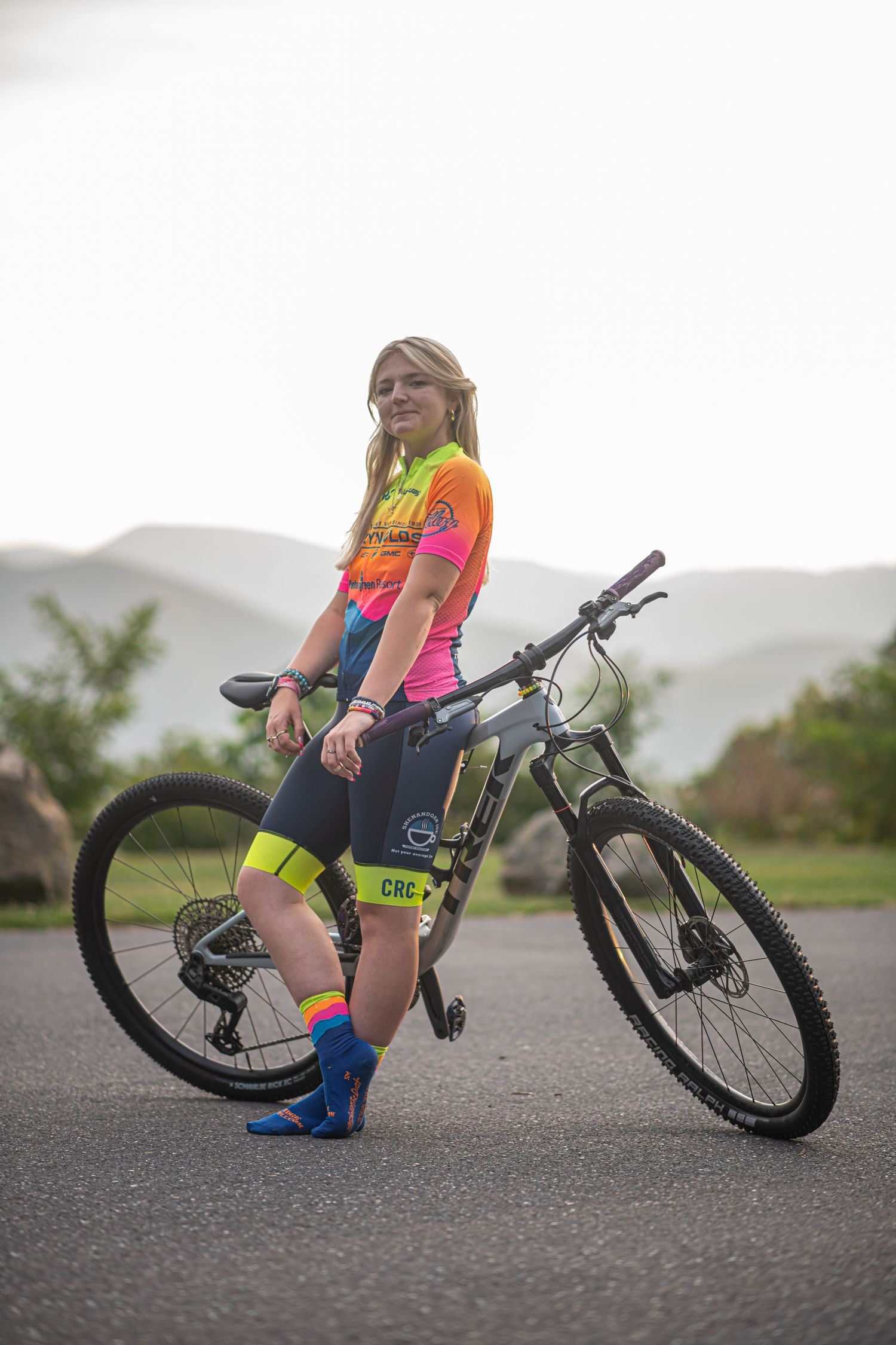 Girl leaning on mountain bike, Virginia