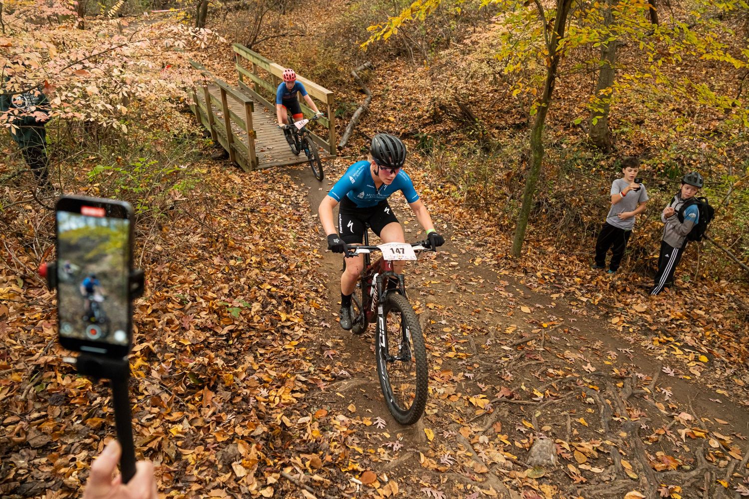 Mountain bike racer riding up hill
