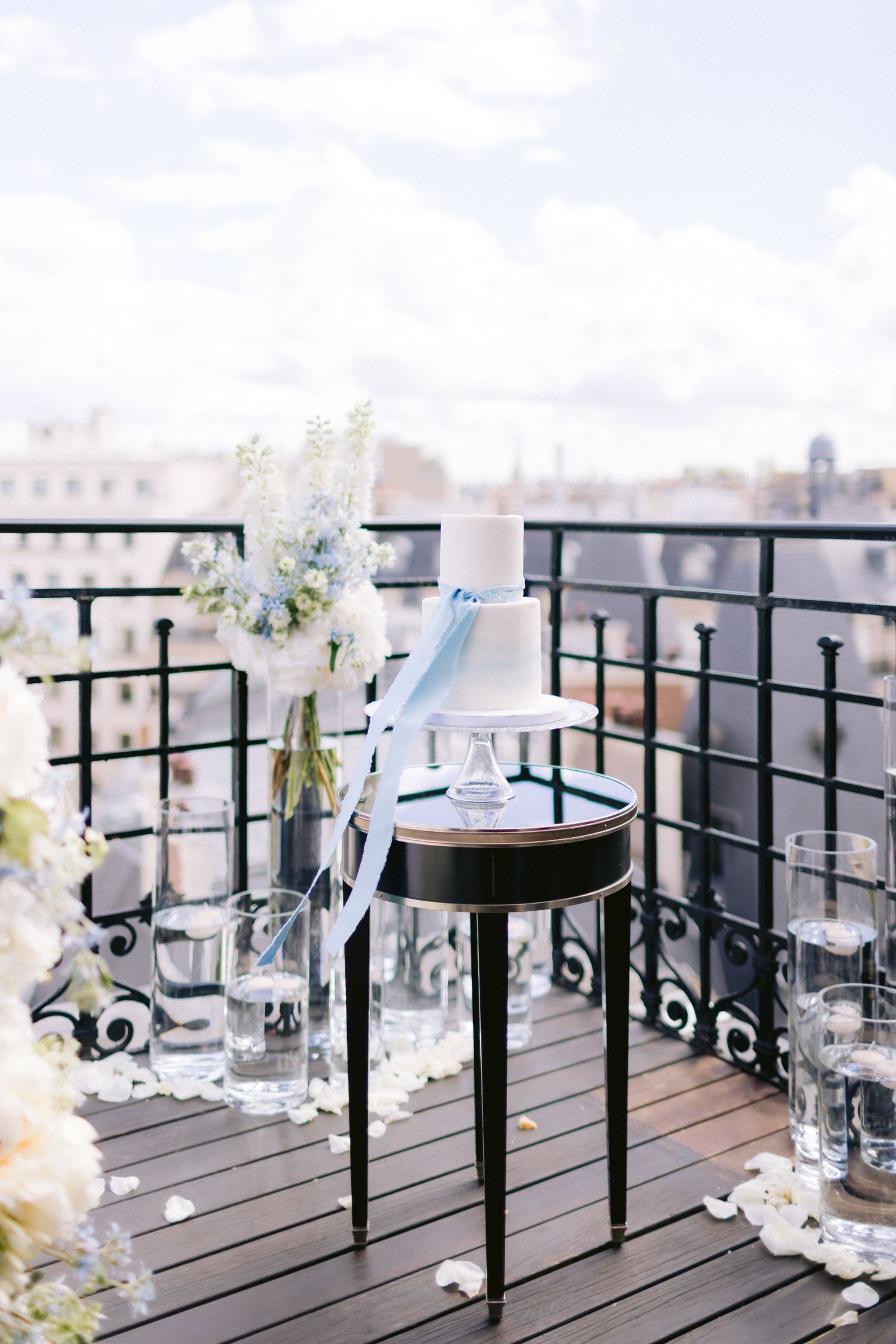 Paris elopement setting photographed on a balcony at Hotel Saint-Régis