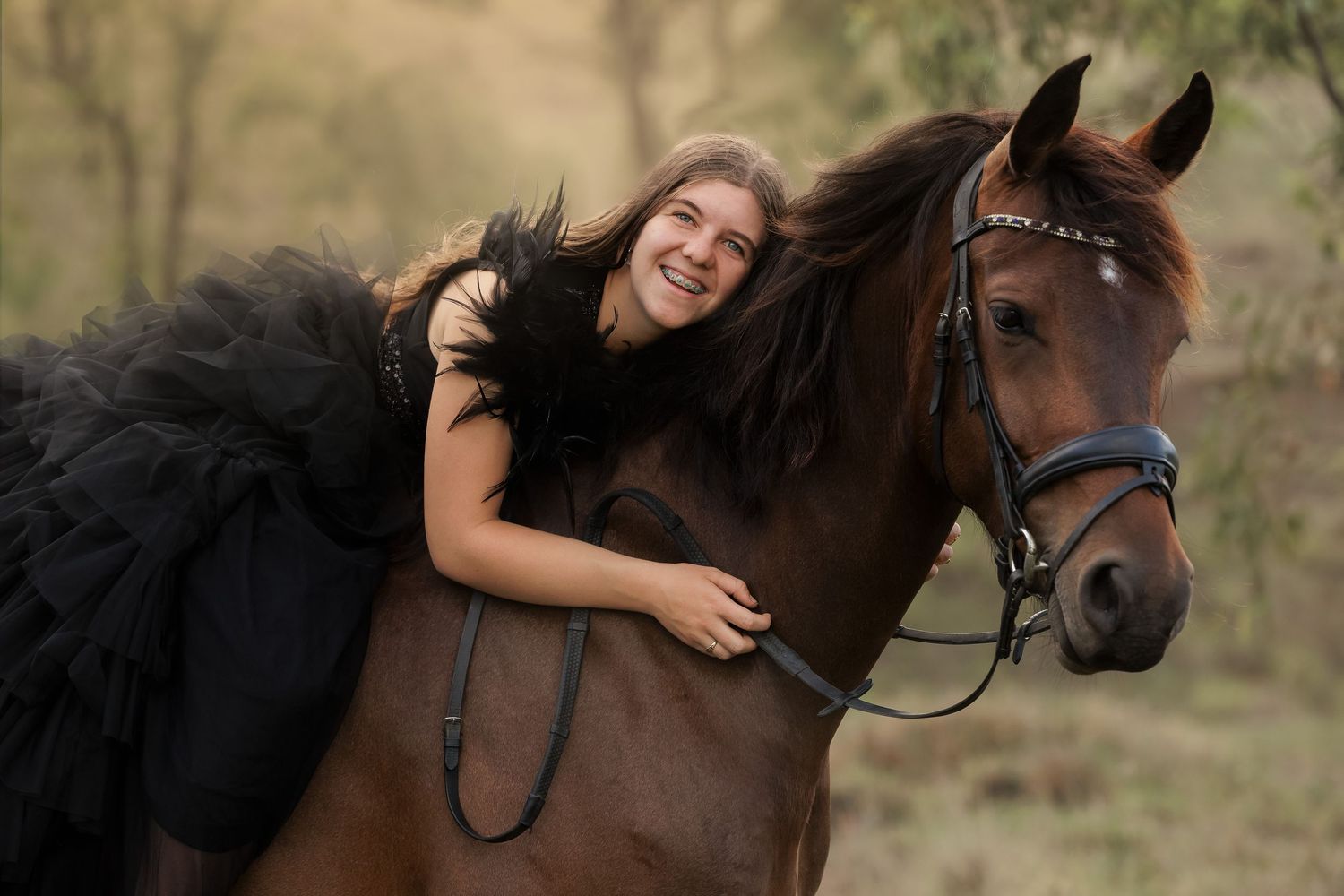 A series of connected photos showing a person in black riding and interacting with a dark brown horse in an outdoor setting.