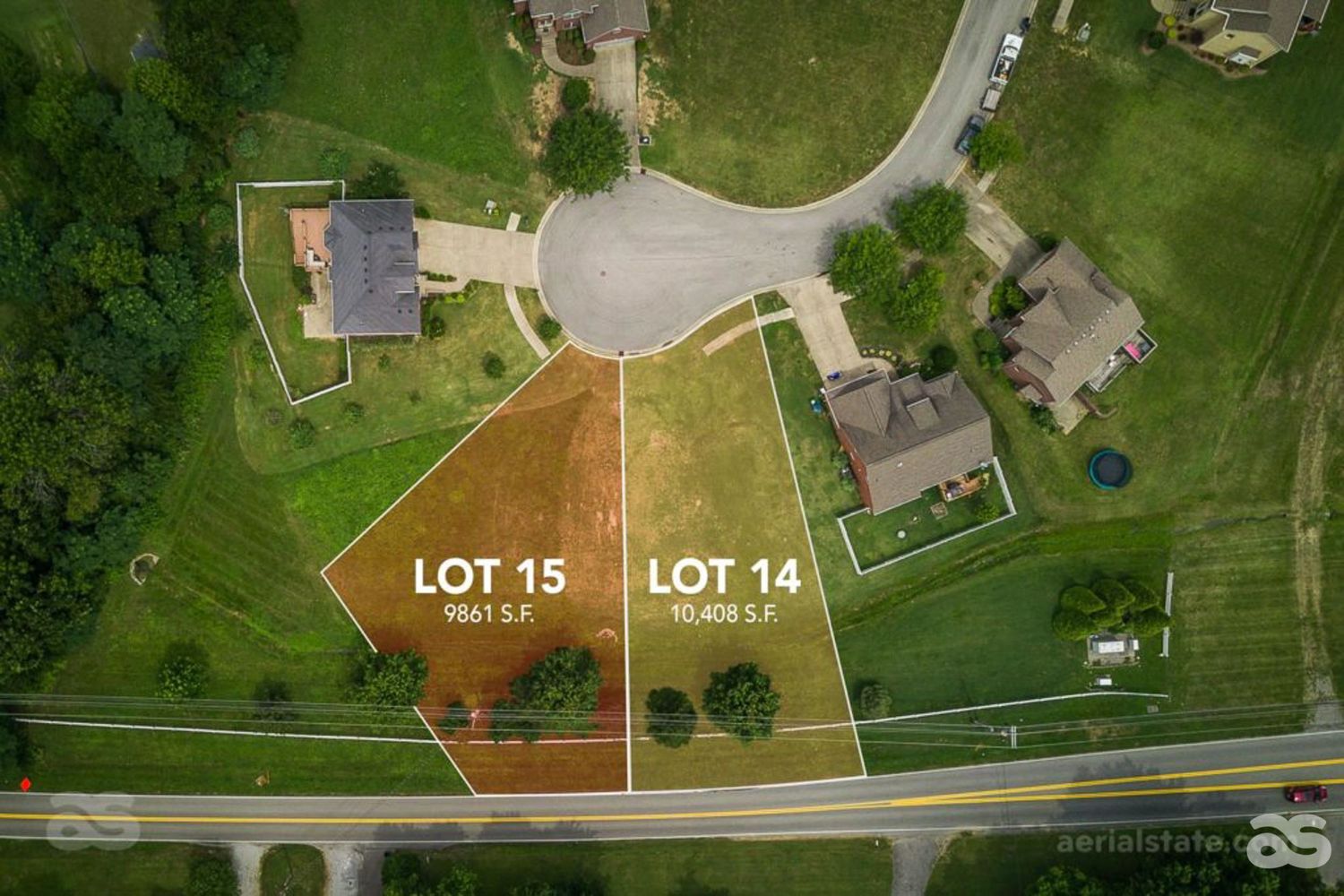 Aerial photo of residential property with lot lines outlined, example image for real estate listing services.