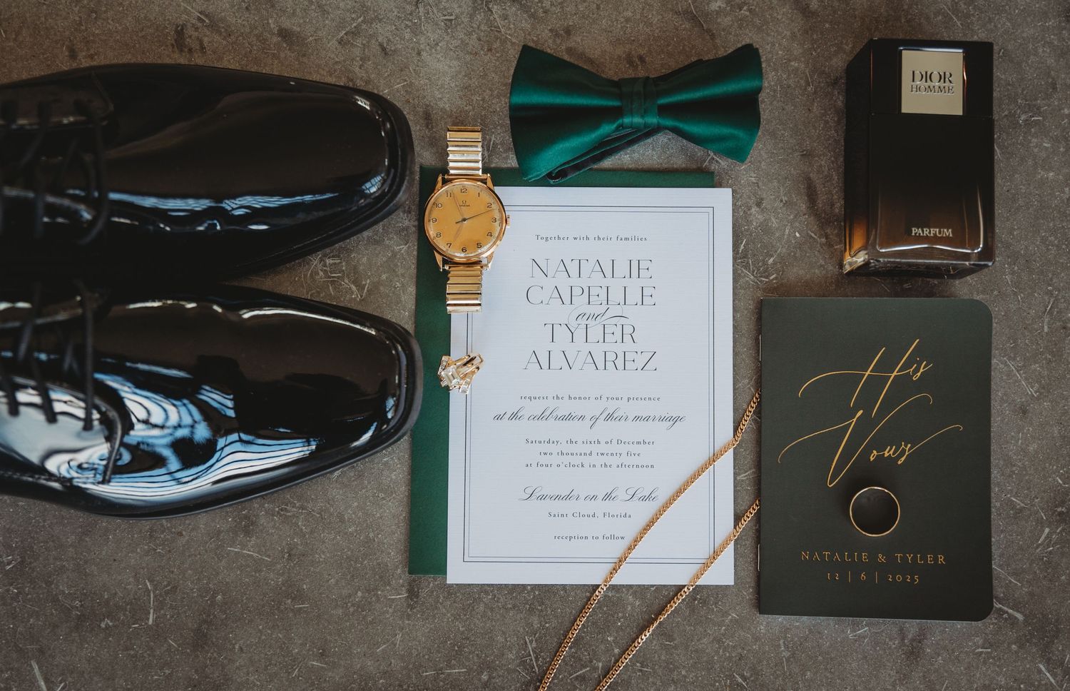 A collection of wedding stationery items including invitations, envelopes, rings, and decorative elements from a Panama City Beach wedding.