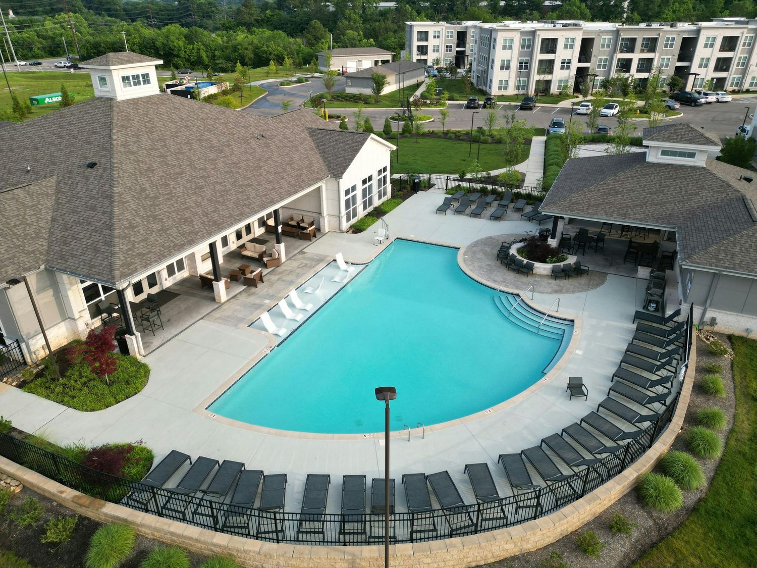 Community swimming pool photo included as neighborhood amenity highlight for real estate listings.