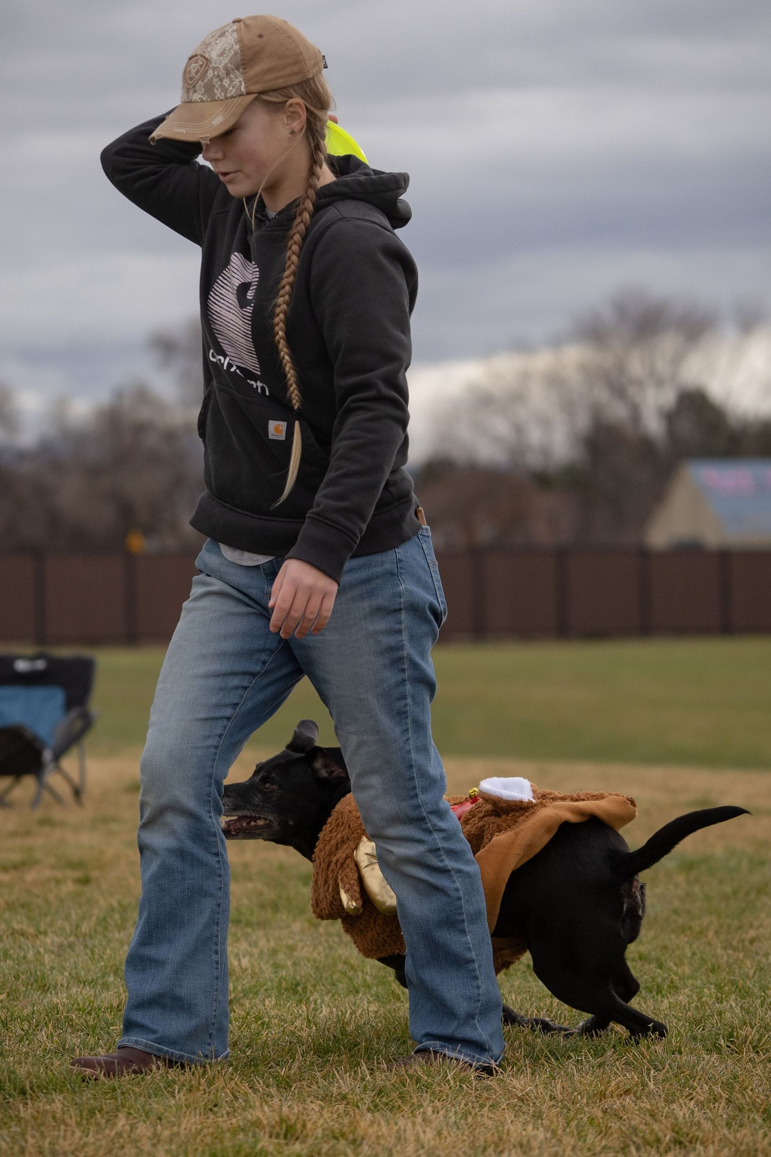 Handler throwing a frisbee for a dog during Boise Disc Dogs Toss and Fetch in Idaho